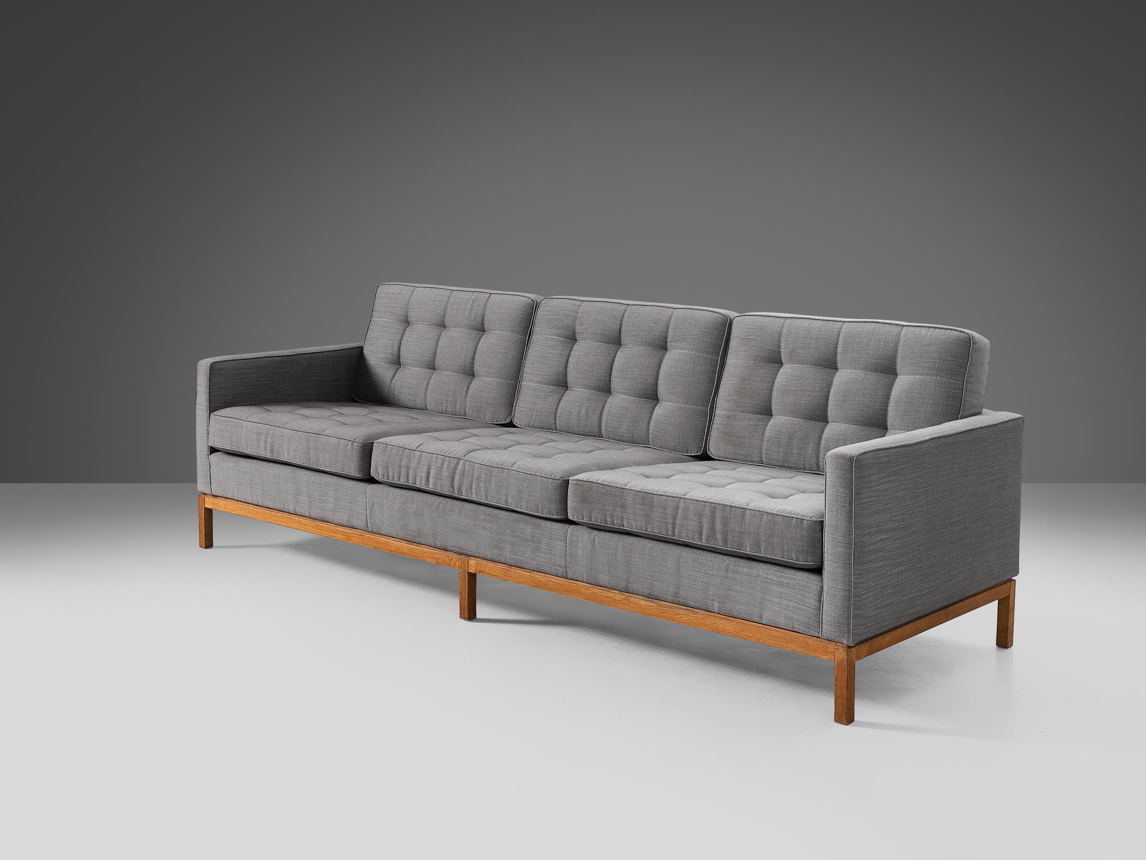Florence Knoll for Knoll International, sofa, model '2557', fabric, teak, 1955

This sofa model 2557 is designed by Florence Knoll for Knoll International in 1955. This sofa is simplistic, yet stylish in its appearance. Due to the grey color of the