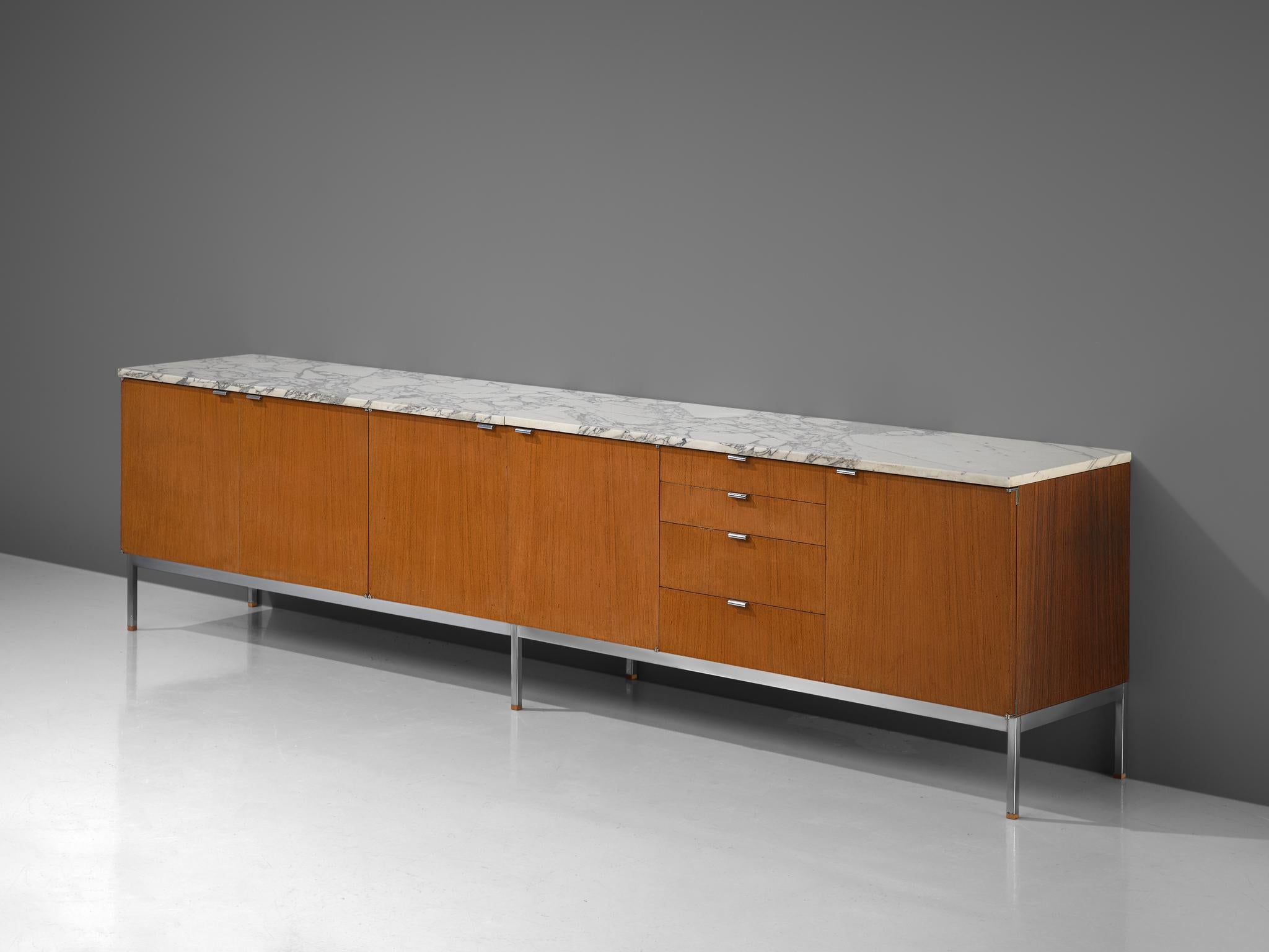 Florence Knoll for Knoll International, sideboard, teak, marble and metal, United States, 1961. 

Iconic credenza with chromed base and marble top designed by Florence Knoll for Knoll International. It is rare to find sideboard with the length of