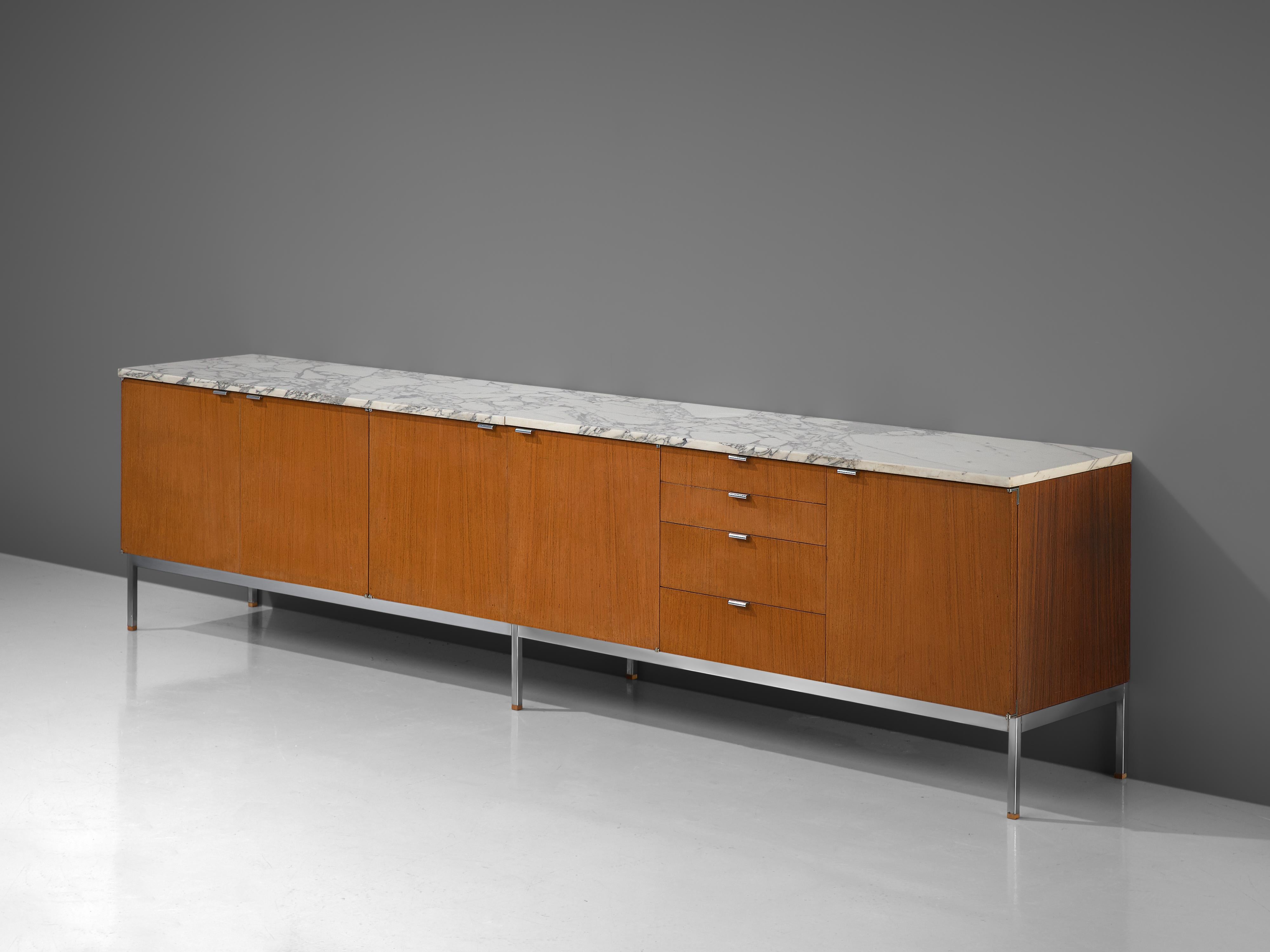 Florence Knoll for Knoll International, sideboard, teak, marble, metal, United States, design 1961

Iconic credenza with chromed base and marble top designed by Florence Knoll for Knoll International. It is rare to find sideboard with the length