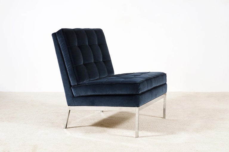 Lounge chair model 65 designed by Florence Knoll and produced by Knoll International, circa 1960.
This chair was manufactured only from 1958 to 1975.
Newly re-upholstered with a navy velvet from the Kvadrat Raf Simons collection.
Chromed steel