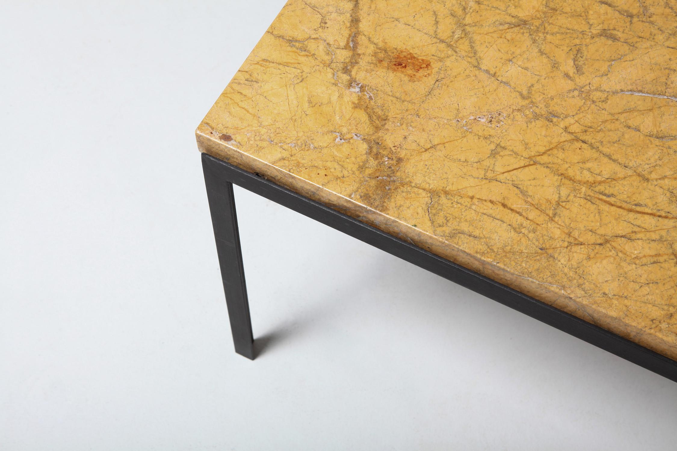 Mid-Century Modern marble side table, designed by Florence Knoll during the 1960s, and manufactured in the United States by Knoll.
We have a similar larger side table available in another listing.
Each table features a mustard colored marble