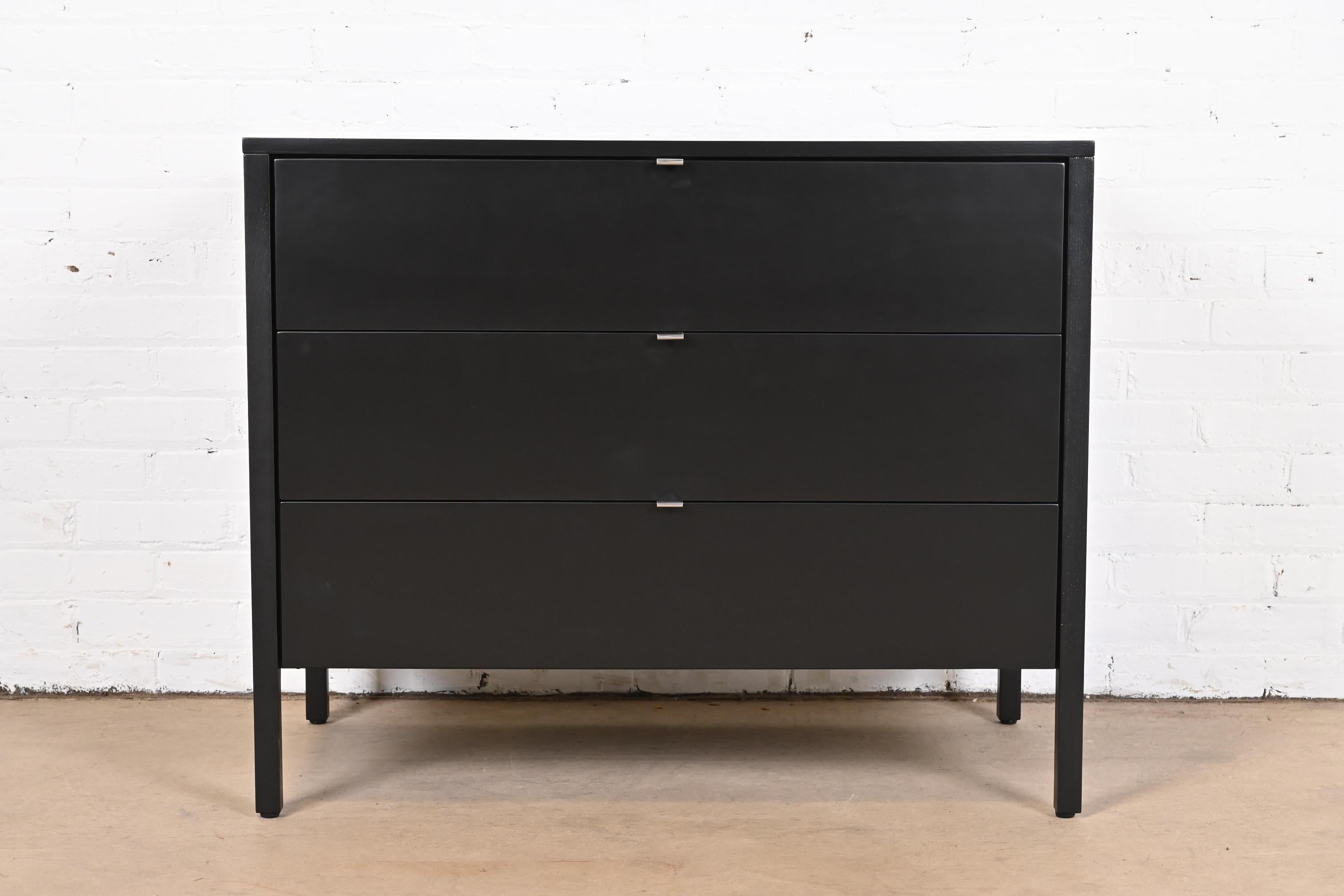 An exceptional Mid-Century Modern black lacquered three-drawer dresser chest

By Florence Knoll for Knoll Associates

USA, Circa 1970s

Black lacquered walnut, with original chrome hardware.

Measures: 36
