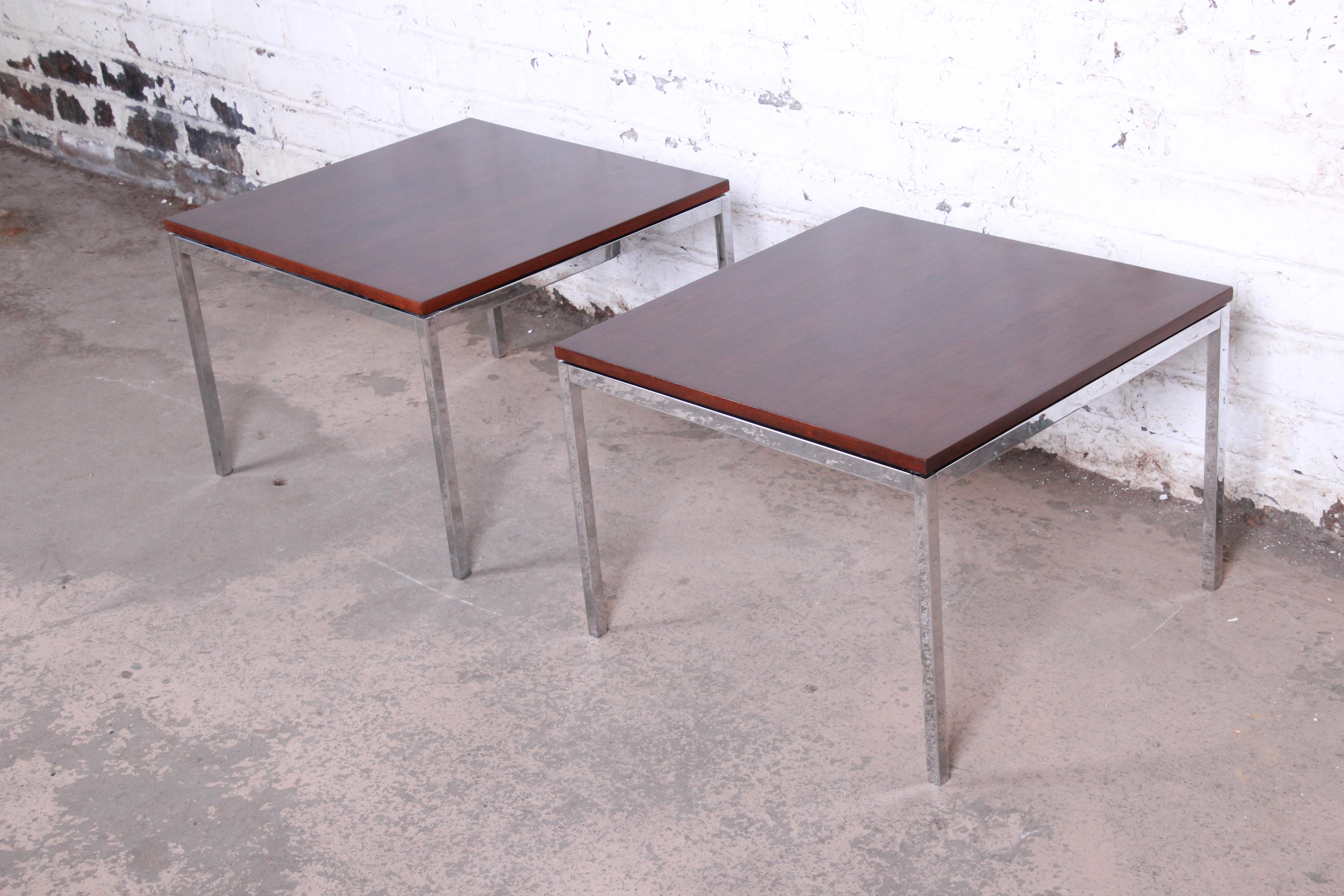A stunning pair of Minimalist Mid-Century Modern square side tables

By Florence Knoll for Knoll Associates

USA, 1960s

Book-matched walnut tops, with chrome legs.

Measures: 24