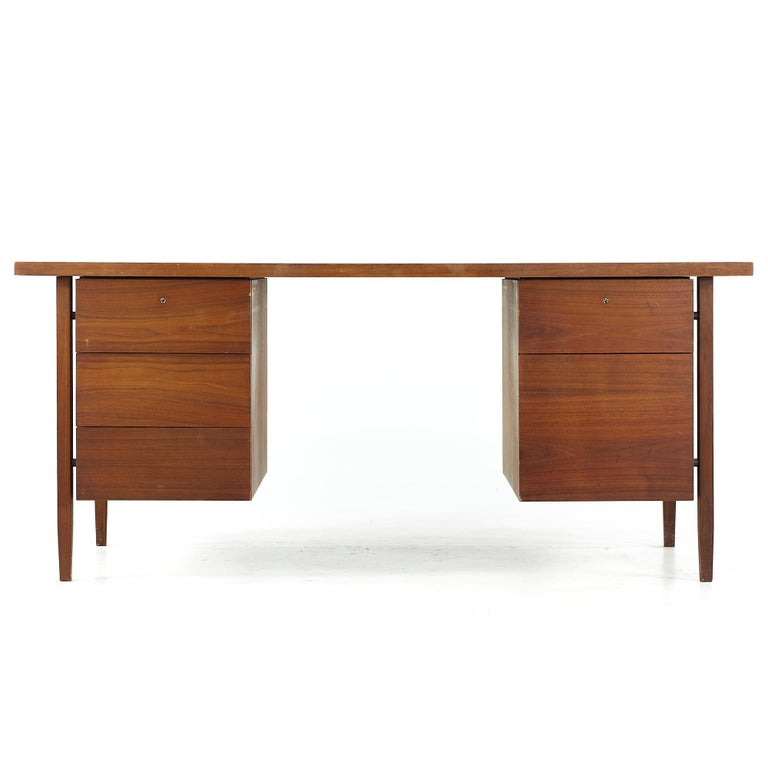 Florence Knoll midcentury walnut executive desk.

This desk measures: 66 wide x 32 deep x 29 high, with a chair clearance of 27.5 inches.

All pieces of furniture can be had in what we call restored vintage condition. That means the piece is
