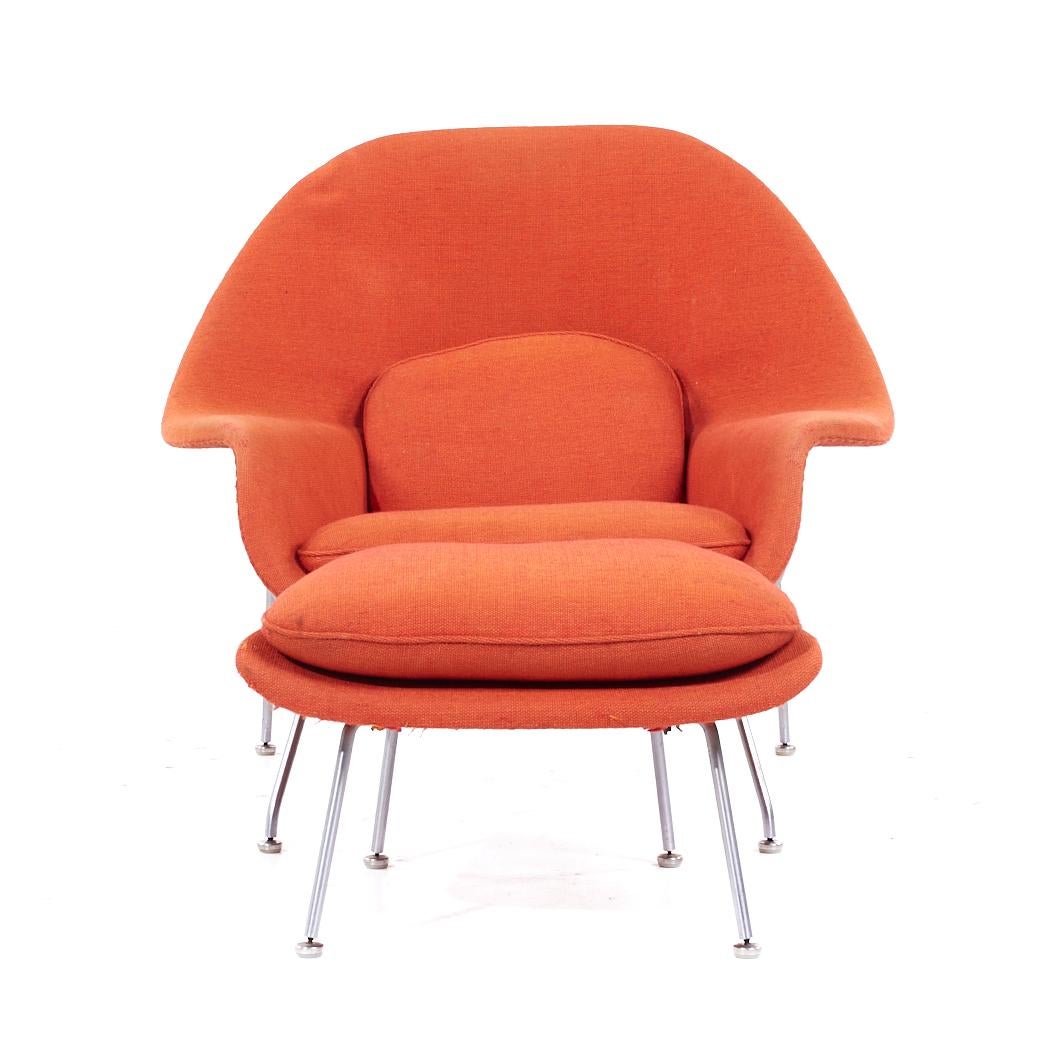 Eero Saarinen for Knoll Mid Century Womb Chair with Ottoman

The chair measures: 38.75 wide x 35 deep x 35.5 high, with a seat height of 17 inches and arm height/chair clearance of 21 inches
The ottoman measures: 25.5 wide x 20.5 deep x 17 inches