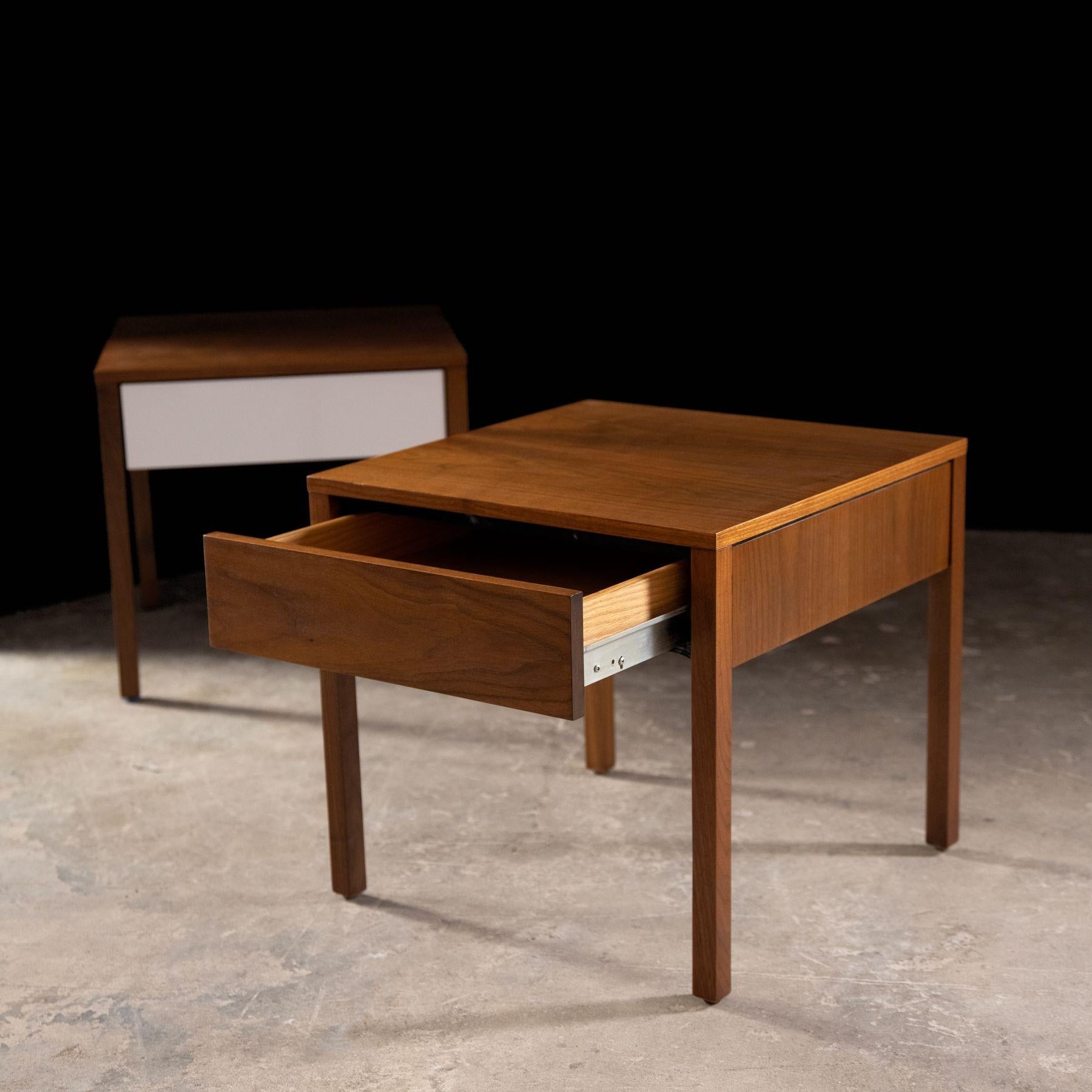 Early production nightstands model 227 designed by Florence Knoll for Knoll Associates, 1956. Nightstands are constructed of walnut and retain the early Knoll label. Both are in excellent condition and have been professionally refinished.