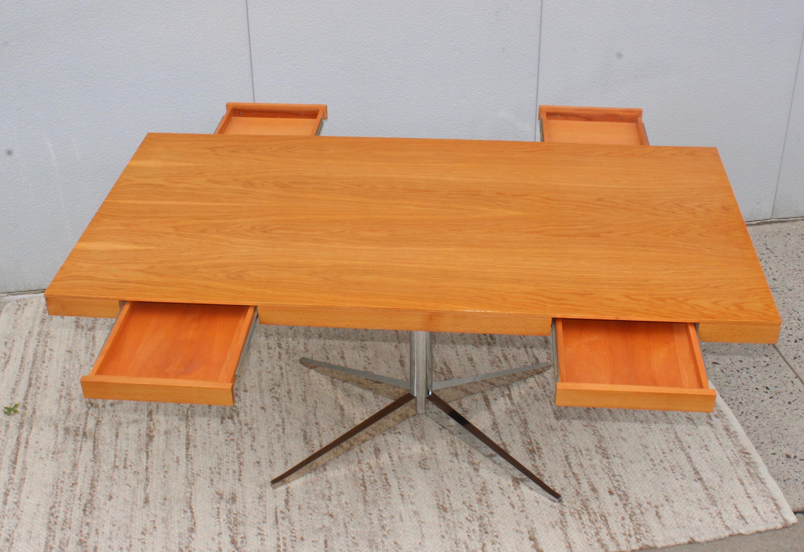 1980s Florence Knoll oak with plated steel base partners desk. With two drawers in each side.