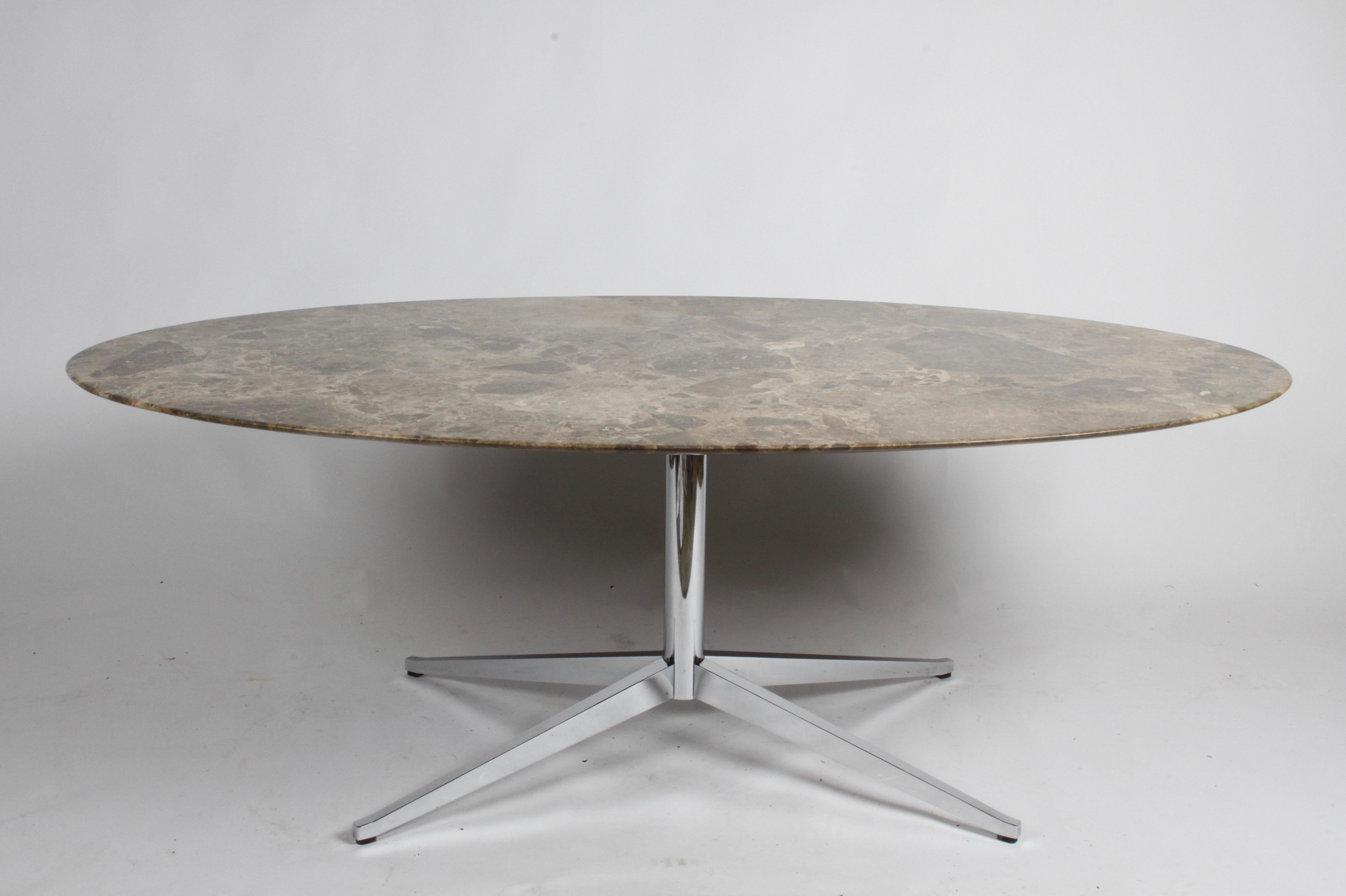 Classic Florence Knoll for Knoll dining table with oval Emperador marble top and chrome base. Emperador marble top colors are olive-beige tones, the marble is quarried in Spain. Chrome base legs have been newly polished and re-chromed. Table had a