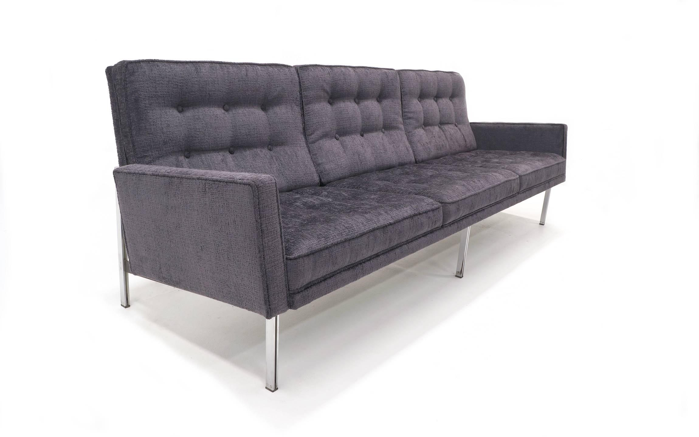 Florence Knoll parallel bar sofa with arms. Restored and upholstered a charcoal / medium to dark gray with just a hint of blue Robert Allen Grand Chenille. This sofa is beautiful.