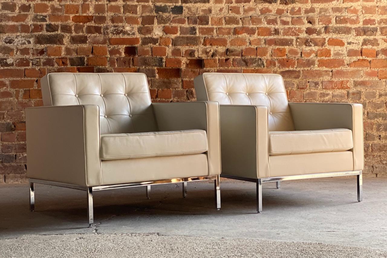 Florence Knoll relax leather armchairs pair by Knoll Studio

A pair of '1-Place' one-seat sofas or armchairs by Florence Knoll for Knoll Studio USA, the chrome frame supporting the finest cream Spinneybeck leather button upholstered seats, these