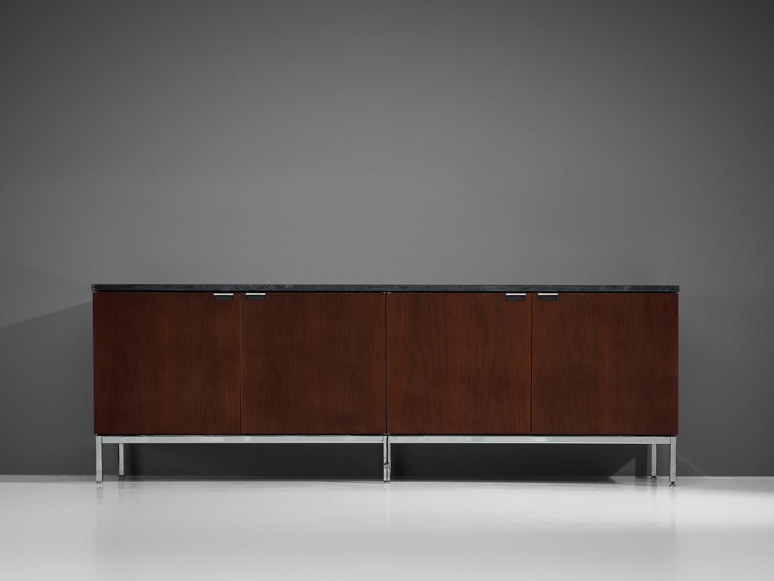 Florence Knoll for Knoll International, sideboard, rosewood, stone, United States, 1961. 

Iconic credenza with chromed base designed by Florence Knoll for Knoll International. This minimalistic designed credenza has modernist details, such as the