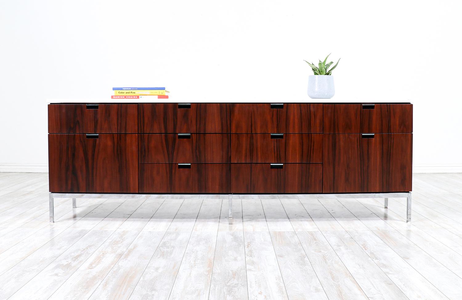 Florence Knoll Rosewood & Steel Credenza with Carrara Marble Top.

________________________________________

Transforming a piece of Mid-Century Modern furniture is like bringing history back to life, and we take this journey with passion and