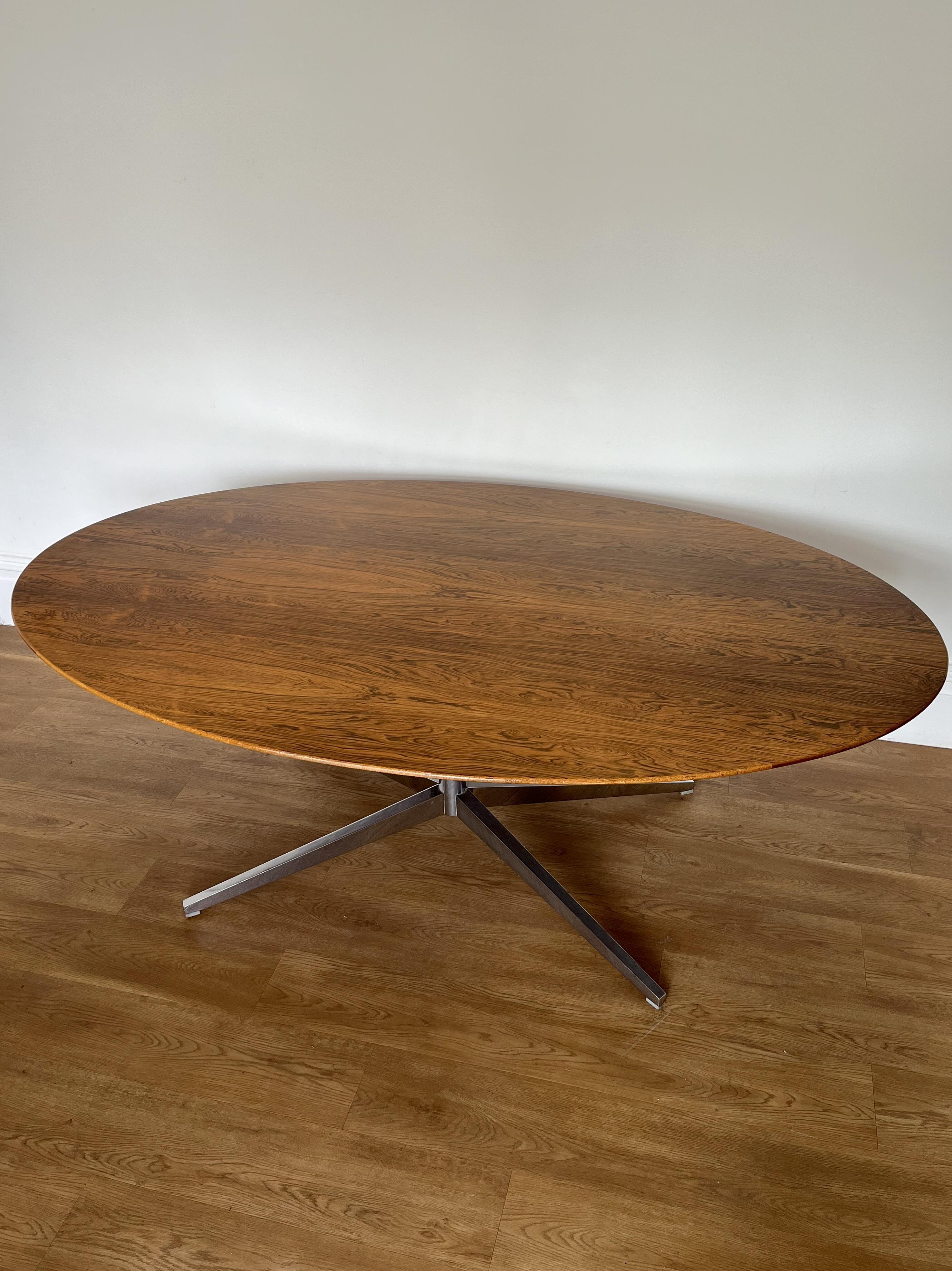 Large Florence knoll oval rosewood table.

The table is in very good original condition and presents really well. There are a few small knocks to the edges and scuffs and scratches to the base. The top is very good showing only light signs of age,