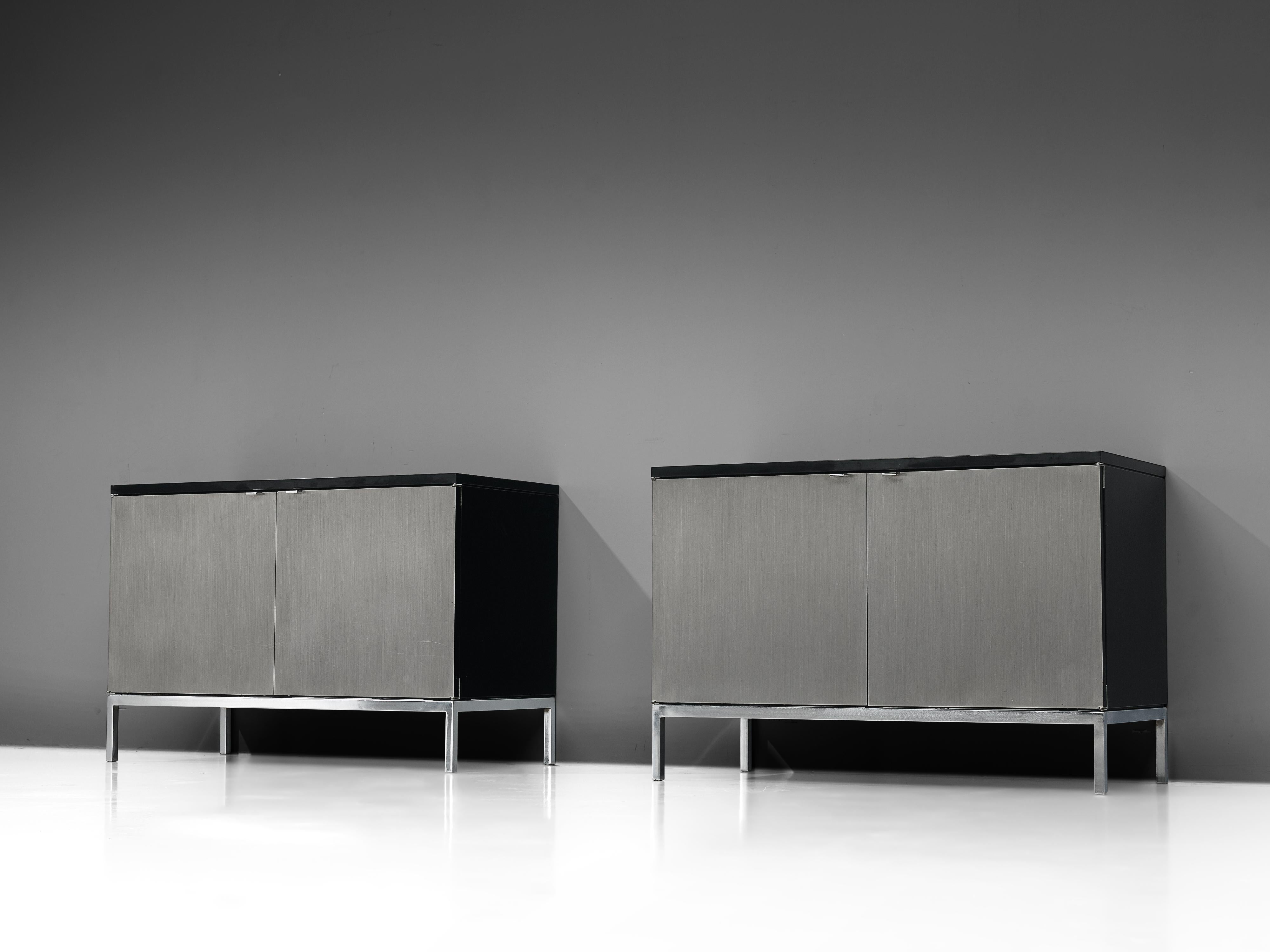Florence Knoll for Knoll International, two sideboards, oak, brushed steel, United States, design 1960s

Two modest sized credenzas with a chrome base designed by Florence Knoll for Knoll International. These exceptional and minimalistic designed