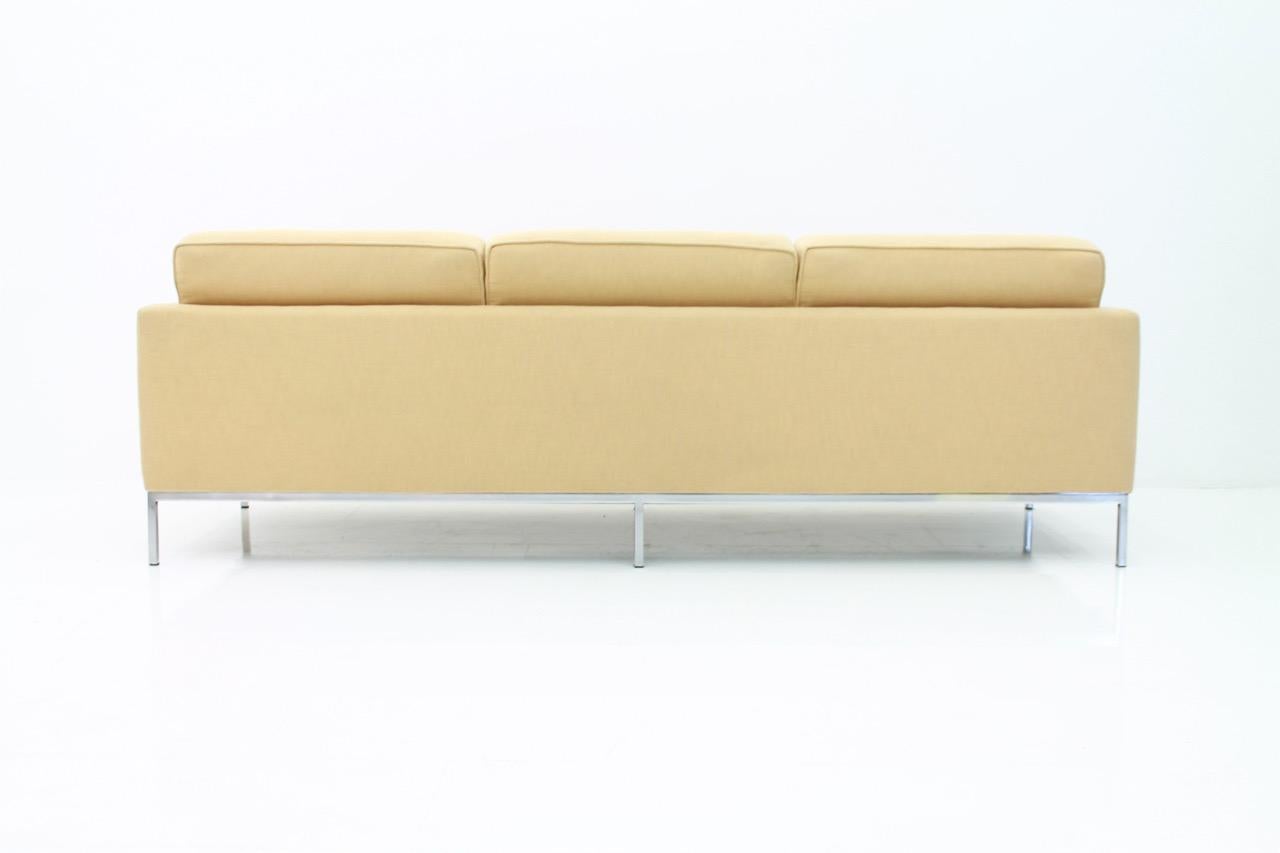 Three-seat sofa by Florence Knoll and made by Knoll International. The sofa was newly upholstery, circa three years ago. 
The condition is very good.
  