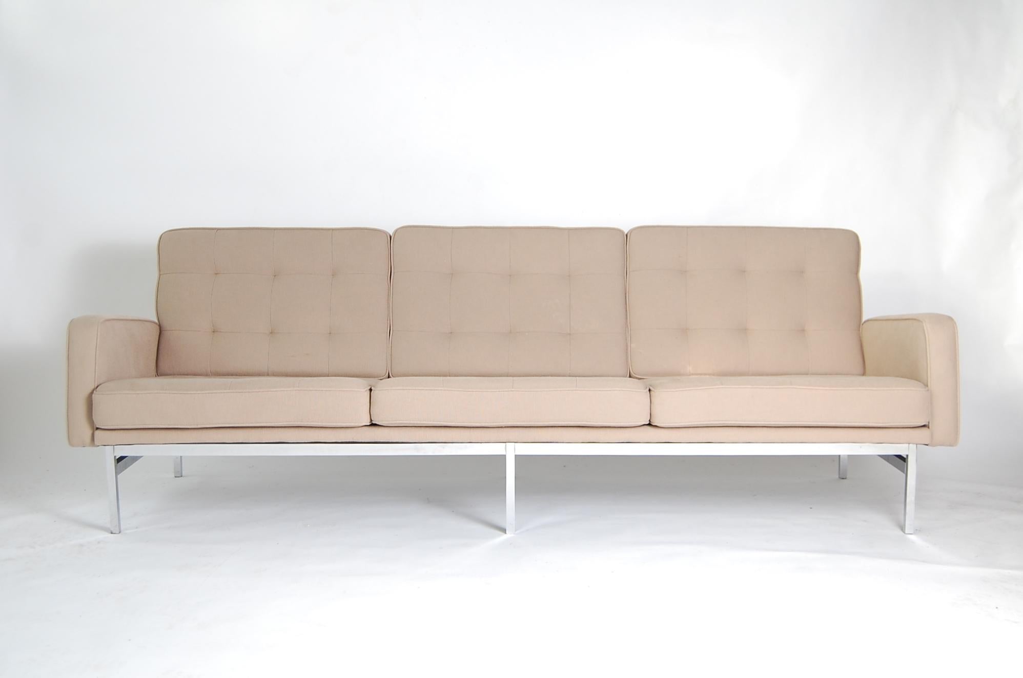 Sofa designed by Florence Knoll, and produced by Knoll Associates, circa 1966. Recently upholstered, including all new foam and strapping.

Please note: Unfortunately, this sofa was sent out on approval, and was returned to us with minor stains.