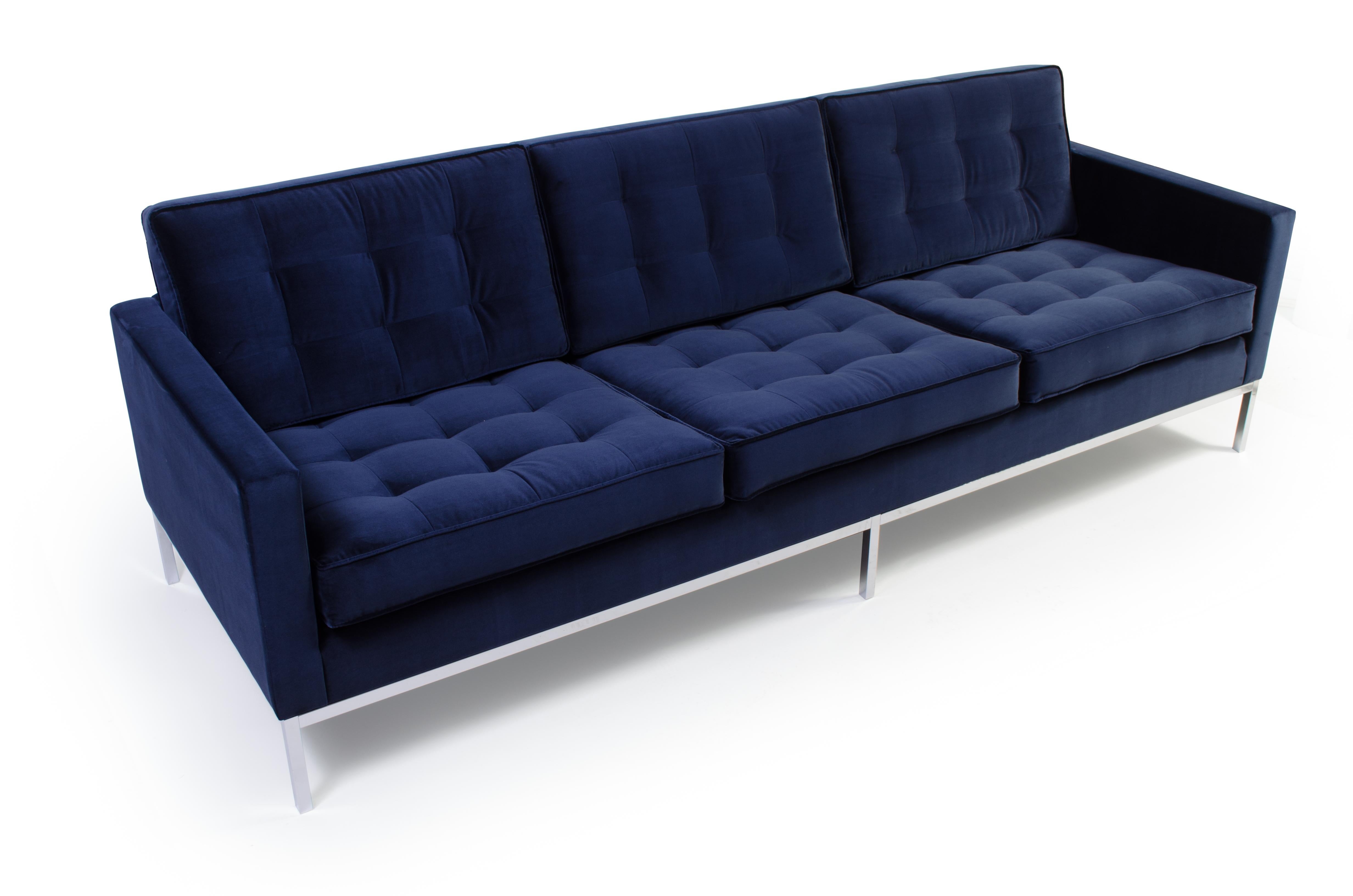This classic Florence Knoll Sofa, a quintessential piece of mid-century design, is the ultimate statement of style, elegance and comfort with its clean lines and exemplary proportions. Newly reupholstered in rich Italian Navy velvet, Knoll's iconic