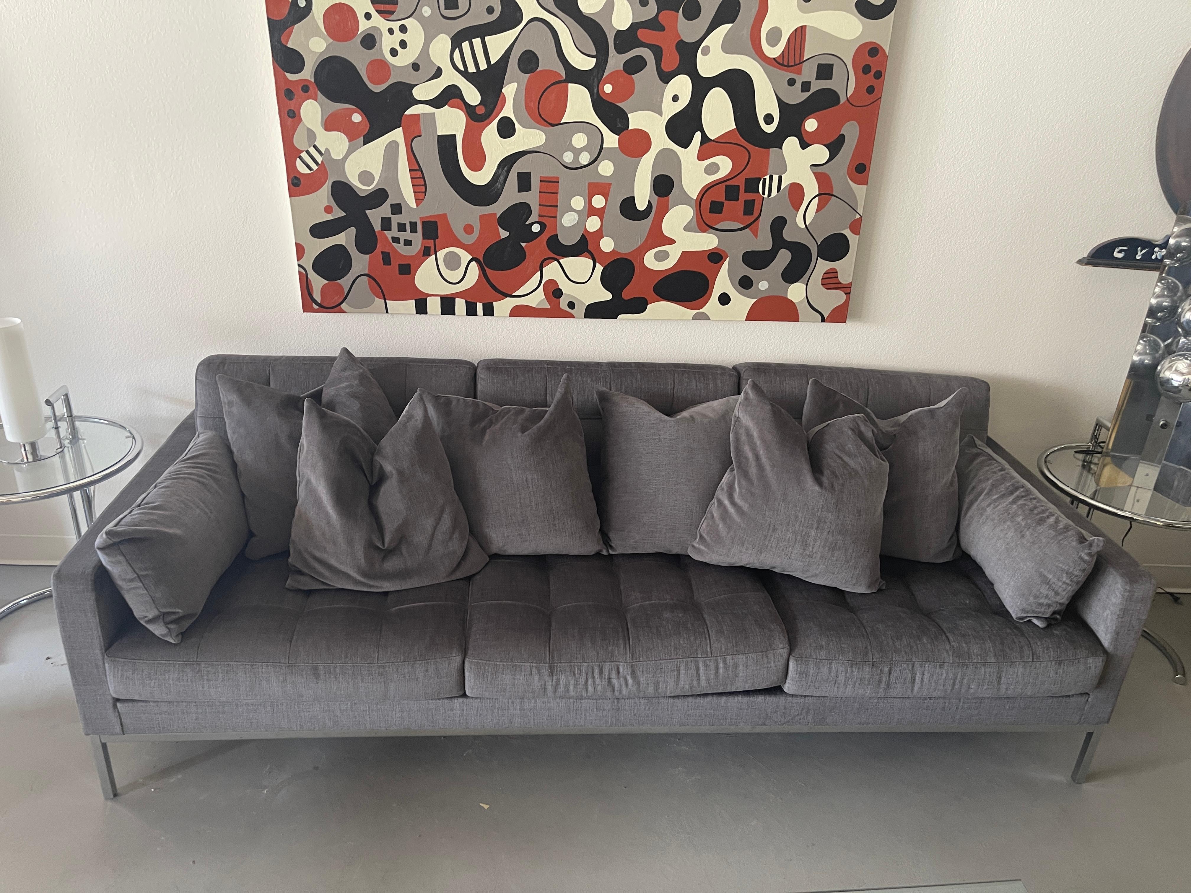 Beautiful Florence knoll Relaxed Sofa with custom cushions added. This sofa was purchased directly from knoll in 2019 and extra fabric ordered. The fabric is a grey chenille. We're not sure of the name. The owner then had custom down cushions made