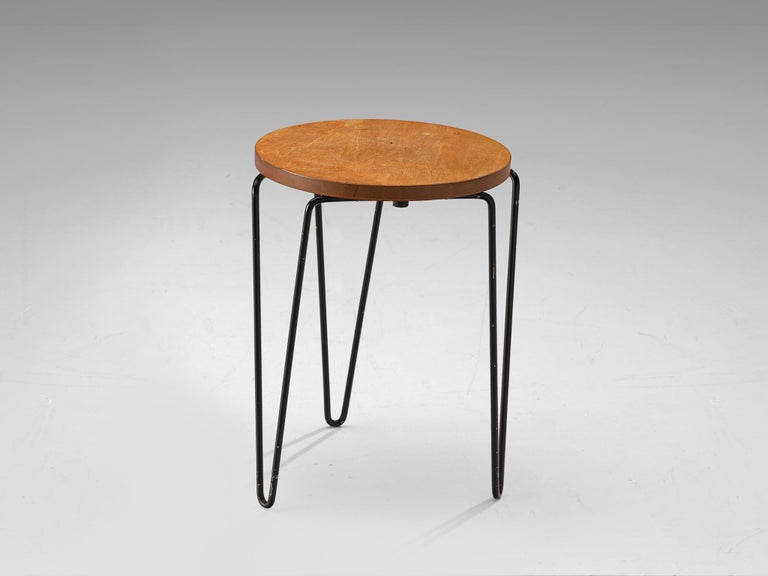 Florence Knoll for Knoll Associates, stool model 75, birch and metal, United States, 1948.

Florence Knoll’s Model 75 stacking stool is made of a black lacquered steel hairpin base and a birch top. The model was an instantly popular addition to what