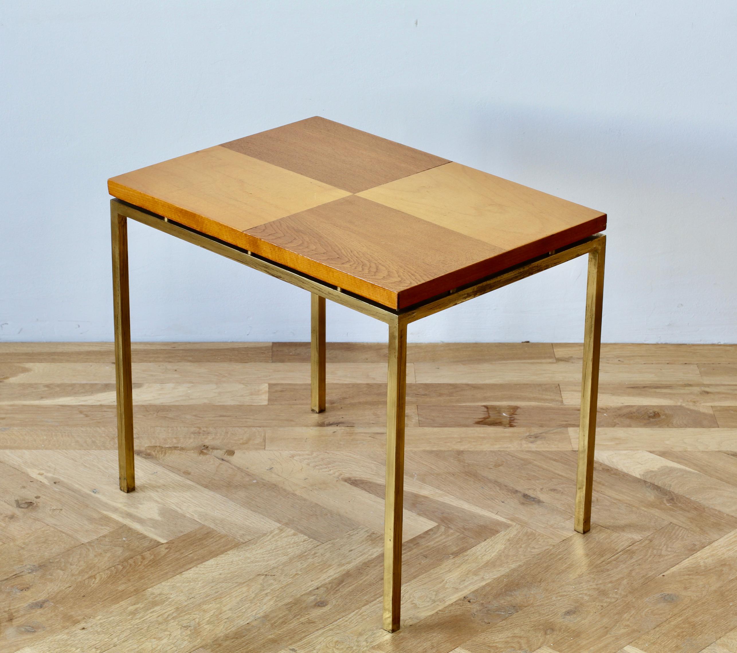 A wonderful German made Mid-Century one-off / unique tall side or end table in the style of Florence Knoll, circa 1950s. Made from polished square tubular brass and veneered wood in a two-tone checkered pattern. This delightful table, will add
