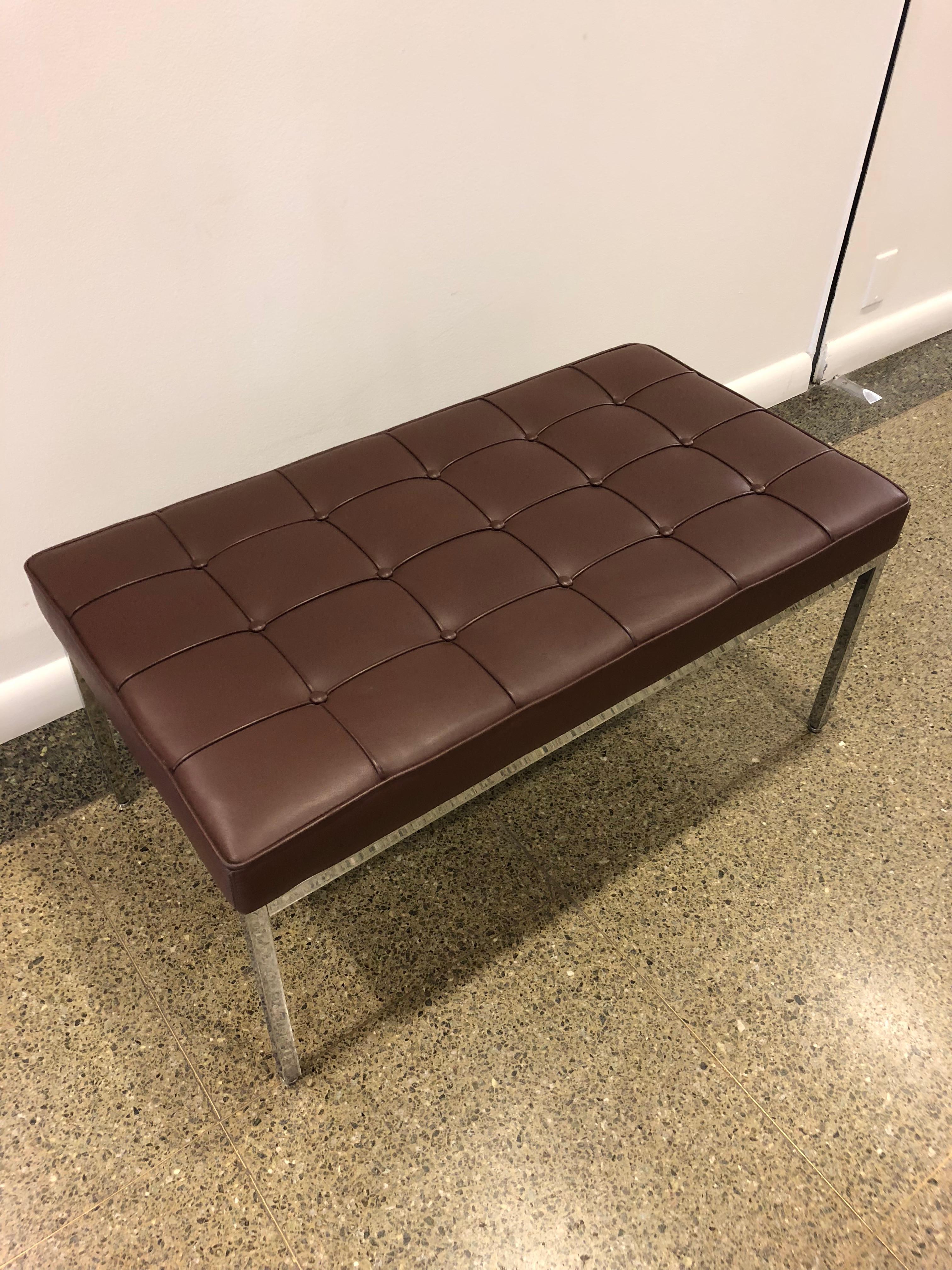 Classic Florence Knoll chocolate brown leather bench with button tufting and piping on chrome base.