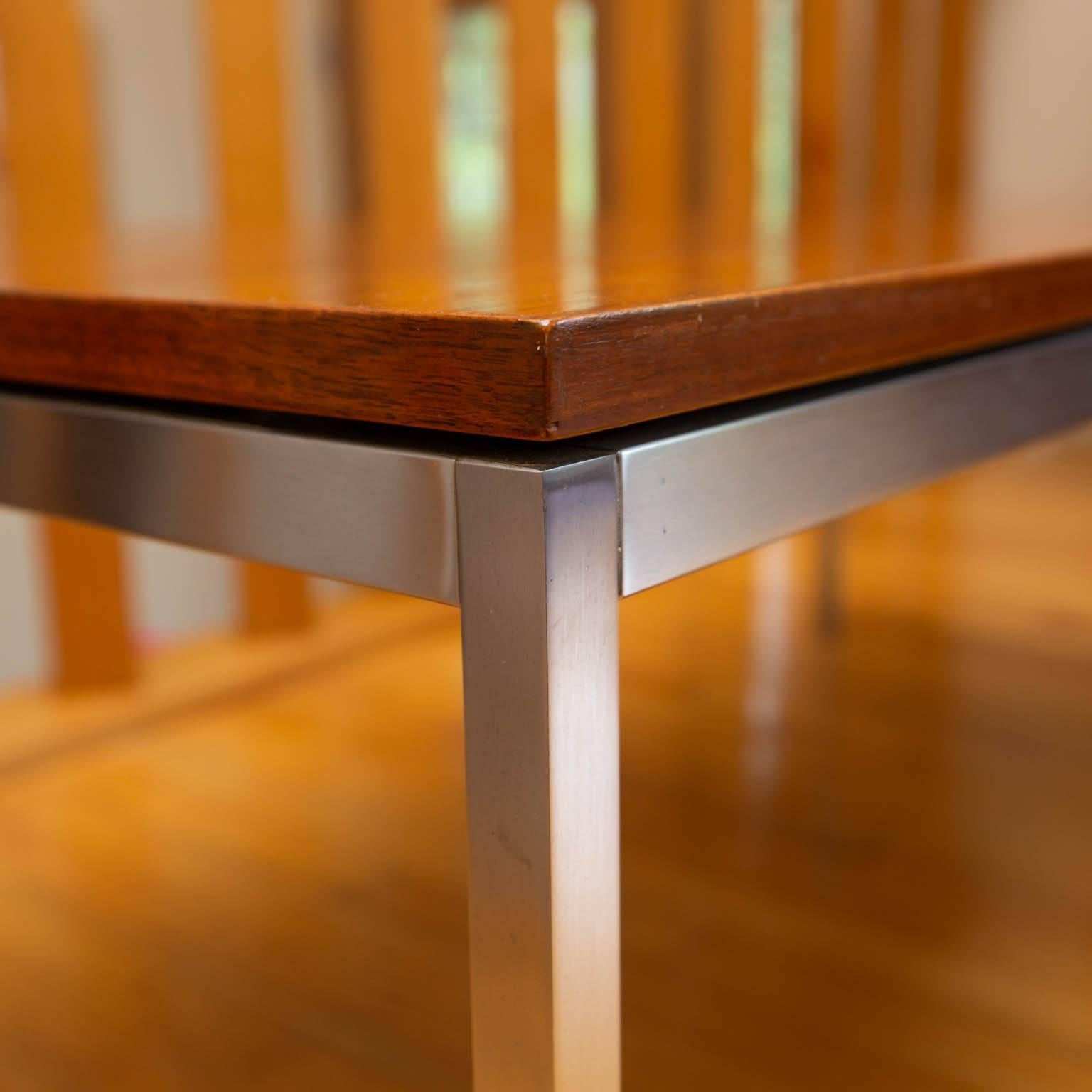 Walnut coffee table on brushed aluminum base. Part of a matched set that is being offered for the first time since the original owners first purchased in 1962.