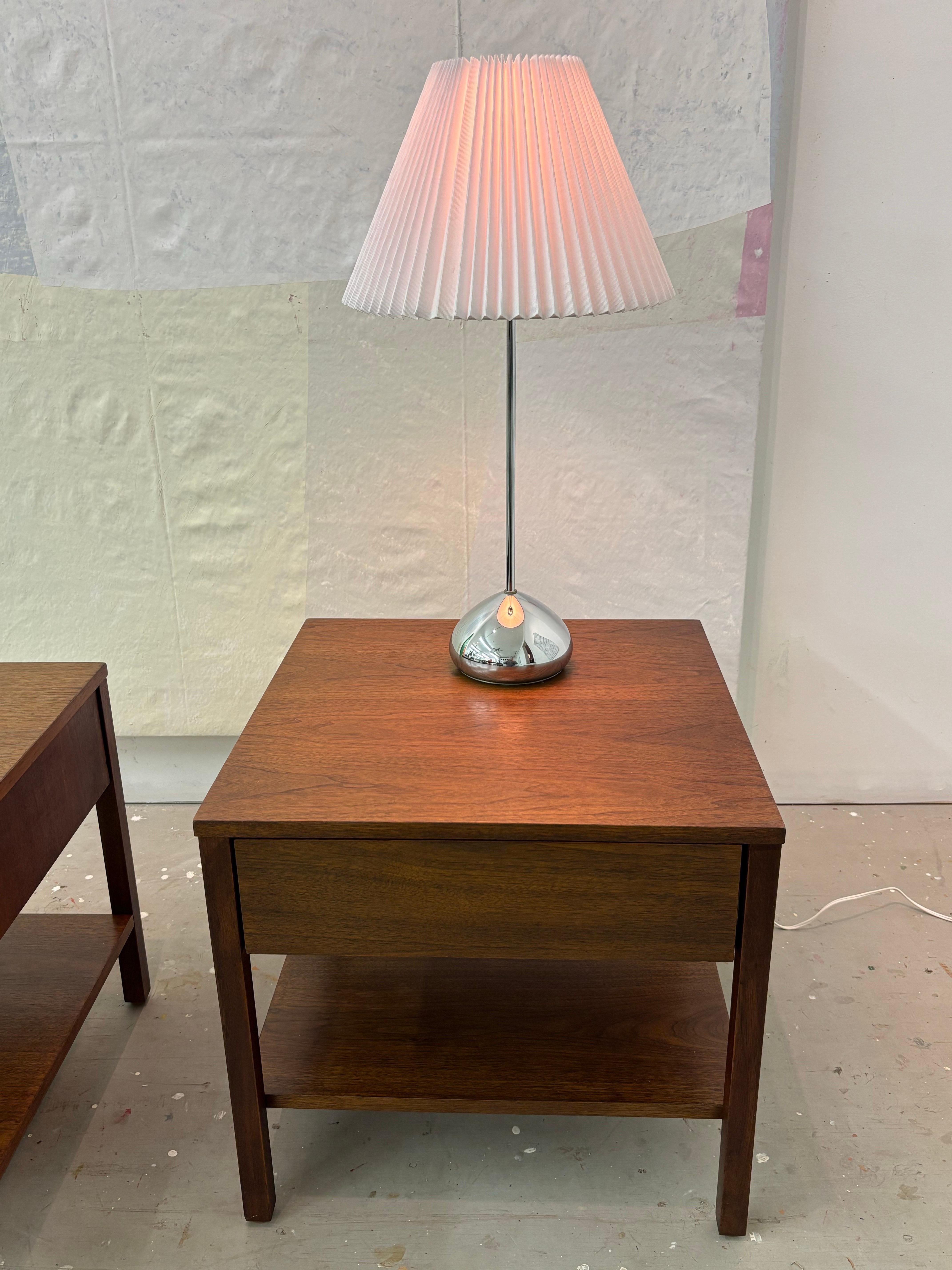 Florence Knoll for Knoll Walnut Night Stands with bottom shelf.  Nice pair with one label still inside drawer.  Overall they are a simple elegant design that looks good mixed in with both Traditional and Modern pieces.  Refinished within last couple