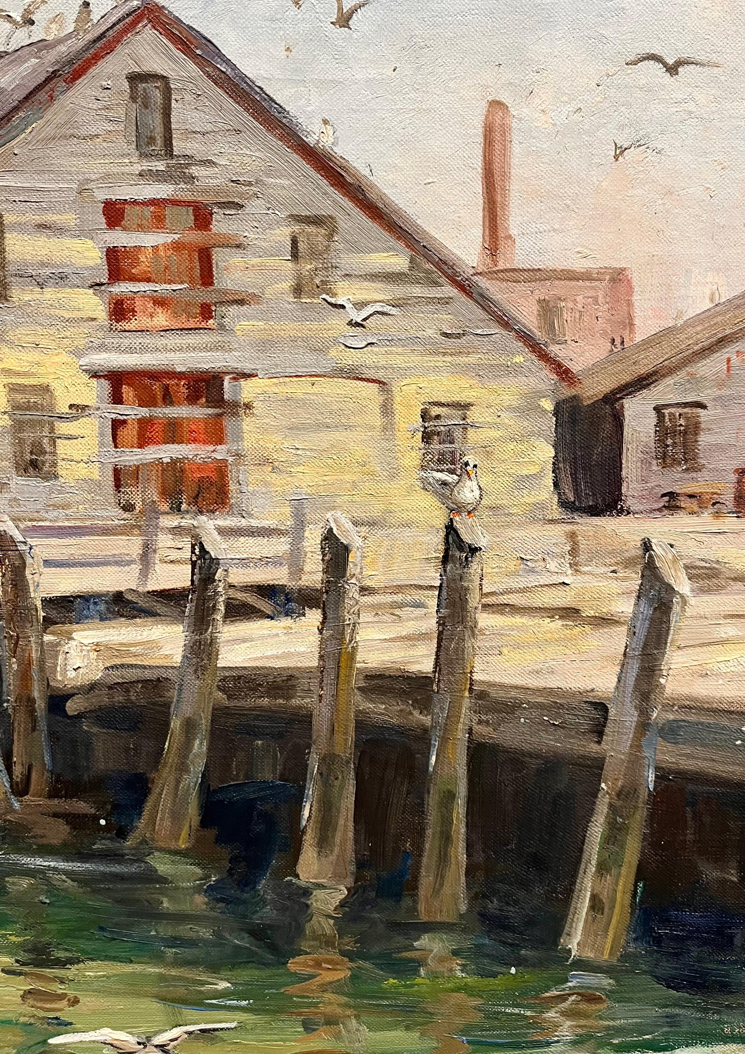 In Gloucester Boats, Florence Prince Ewing captures the character and rhythm of New England’s working waterfront. The composition centers on two fishing vessels tied to a weathered dock, one marked with a simple “For Sale” sign that adds a poignant