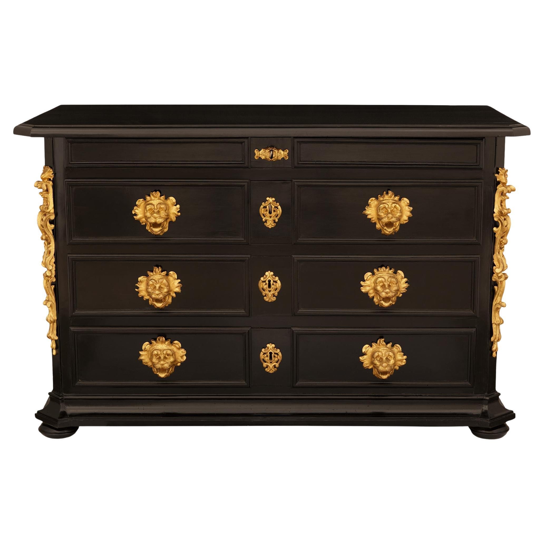 Florentine 17th century Baroque Period ebonized Fruitwood and Giltwood chest