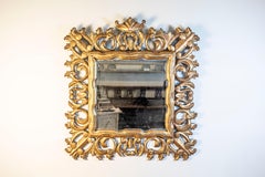 Florentine 20th Century Carved Giltwood Mirror with C-Scrolls and Foliage Motifs