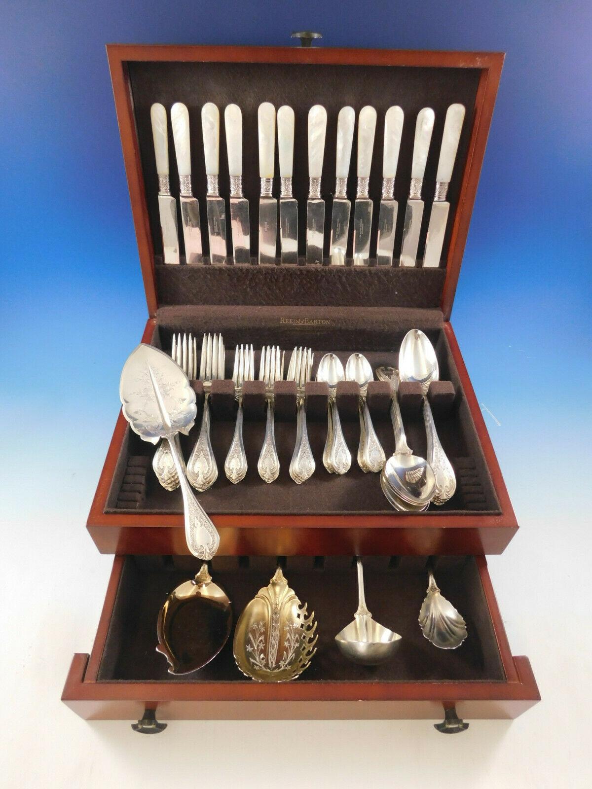 Florentine by John R. Wendt circa 1870 sterling silver flatware set - 65 pieces. This set includes:

12 knives, mother of pearl handles, plated blades, and sterling ferrules, 9