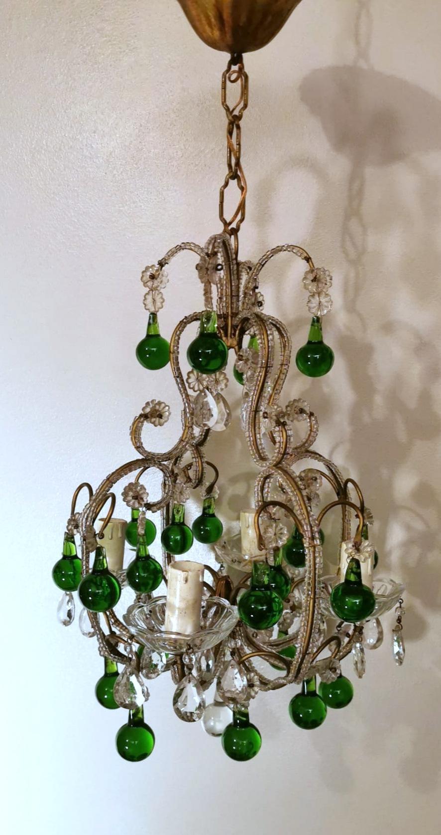 We kindly suggest you read the whole description, because with it we try to give you detailed technical and historical information to guarantee the authenticity of our objects.
Rich and charming Italian chandelier; the elaborate structure is made of