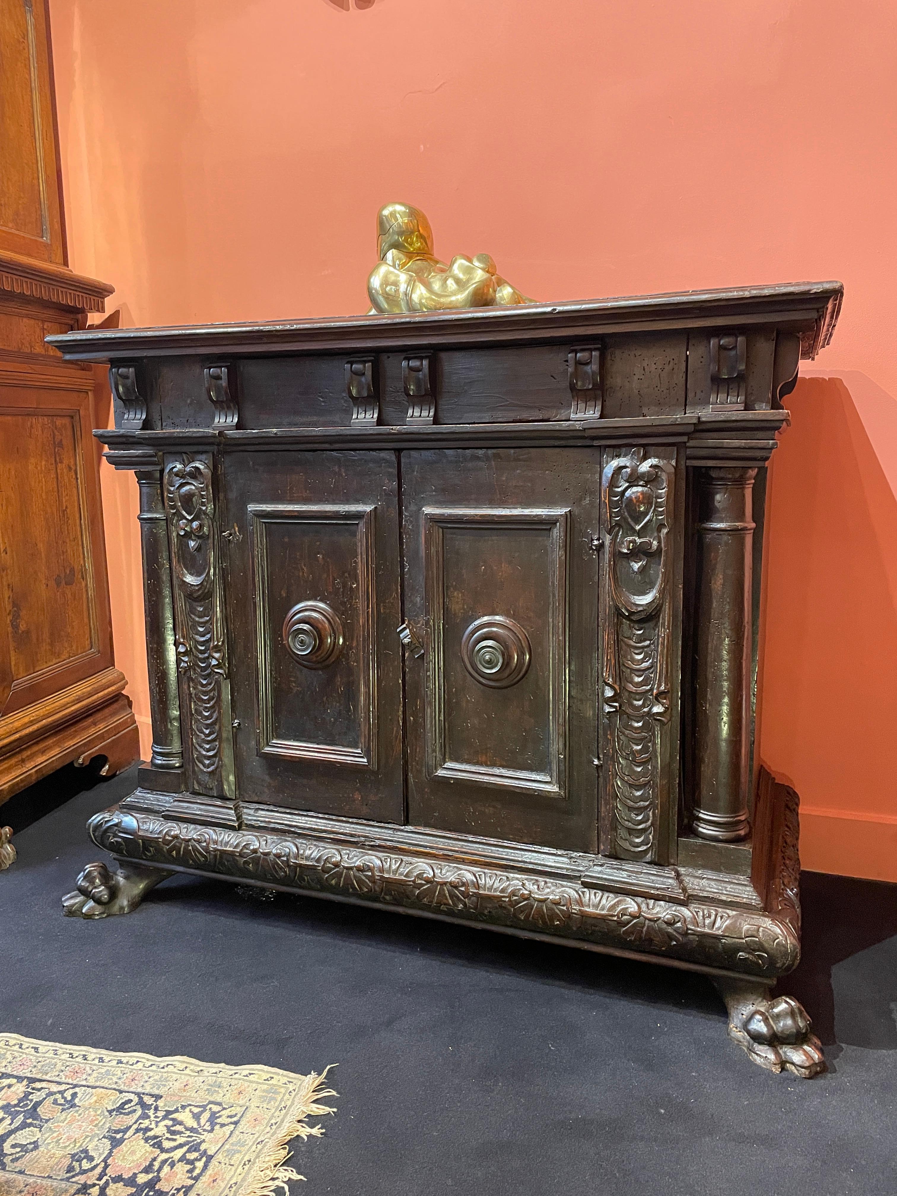 FLORENTINE CREDENZA WITH CORNER COLUMNS


ORIGIN : TOSCANY, ITALY 

PERIOD : LATE 16th CENTURY

Height: 84 cm 
Width: 101 cm
Depth: 48 cm

Walnut wood

Although the first Italian credenza in the form of a sideboard were very simple, they soon