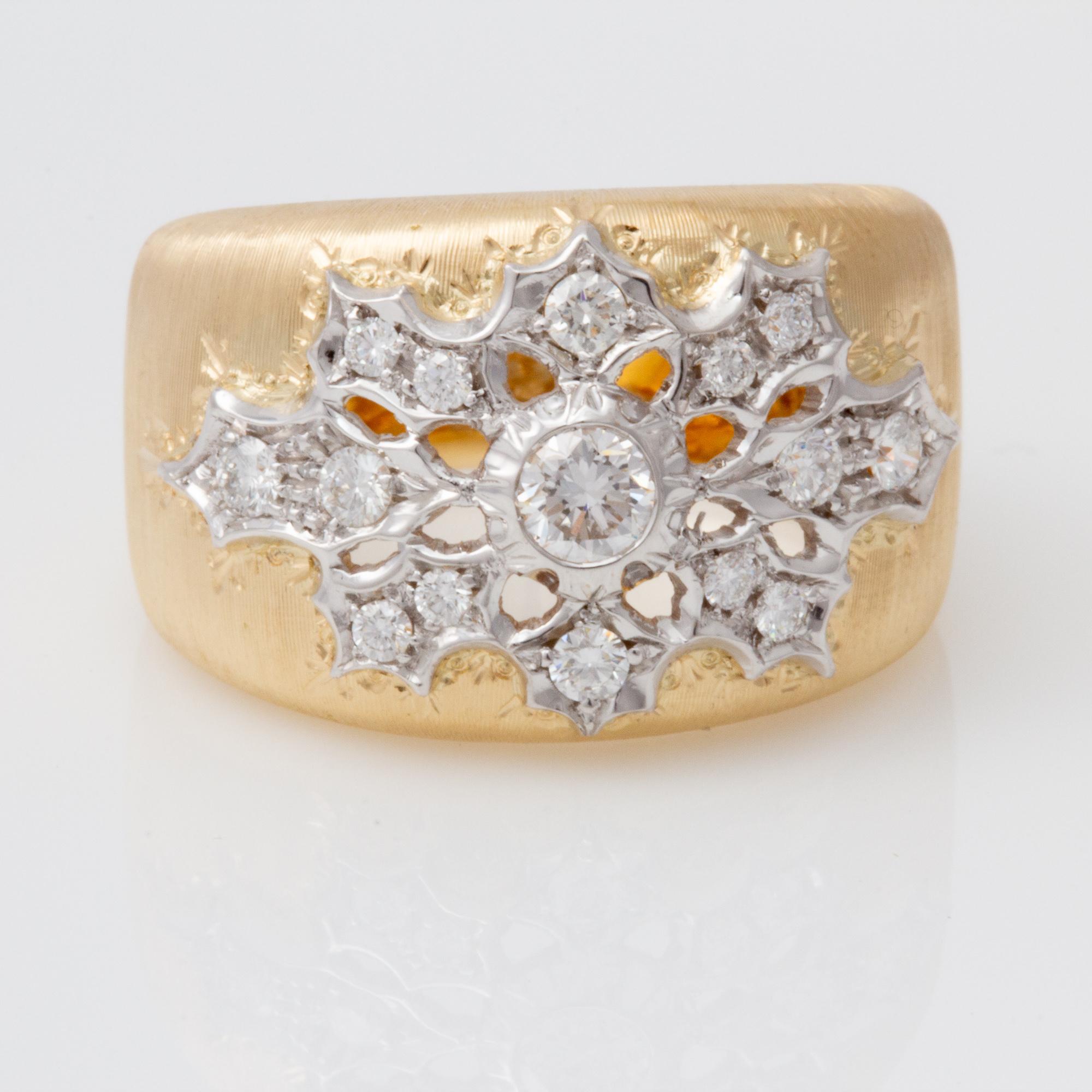 Handcrafted in Italy in an old world Florentine style, this exquisite Diamond ring is set in two tone 18 kt Gold and is truly amazing. 
Created in  a small family run studio in Florence, Italy this artisan style has been produced for nearly 600
