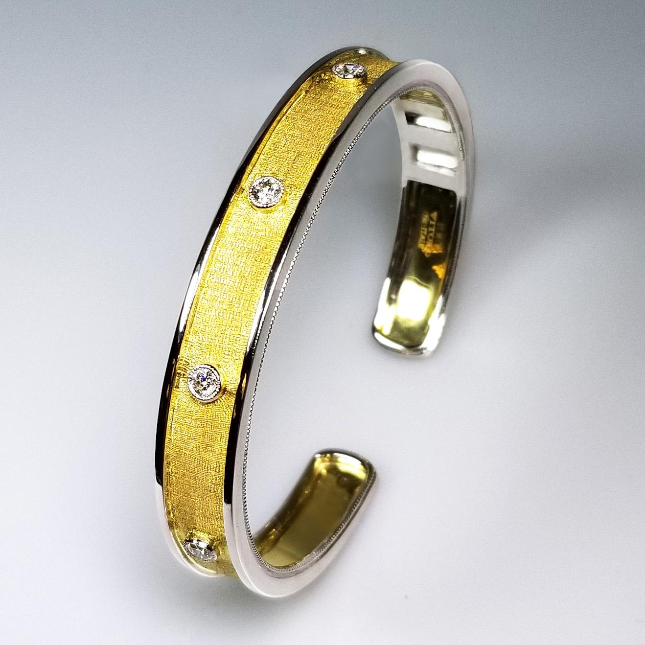 Produced by award winner Italian designer Stefano Vitolo. Stefano creates custom artisanal, one of a kind jewelry with excellent gemstones in a truly old word Italian craftsmanship
This handcrafted bangle has 0.95 carat total weight of F/G color and