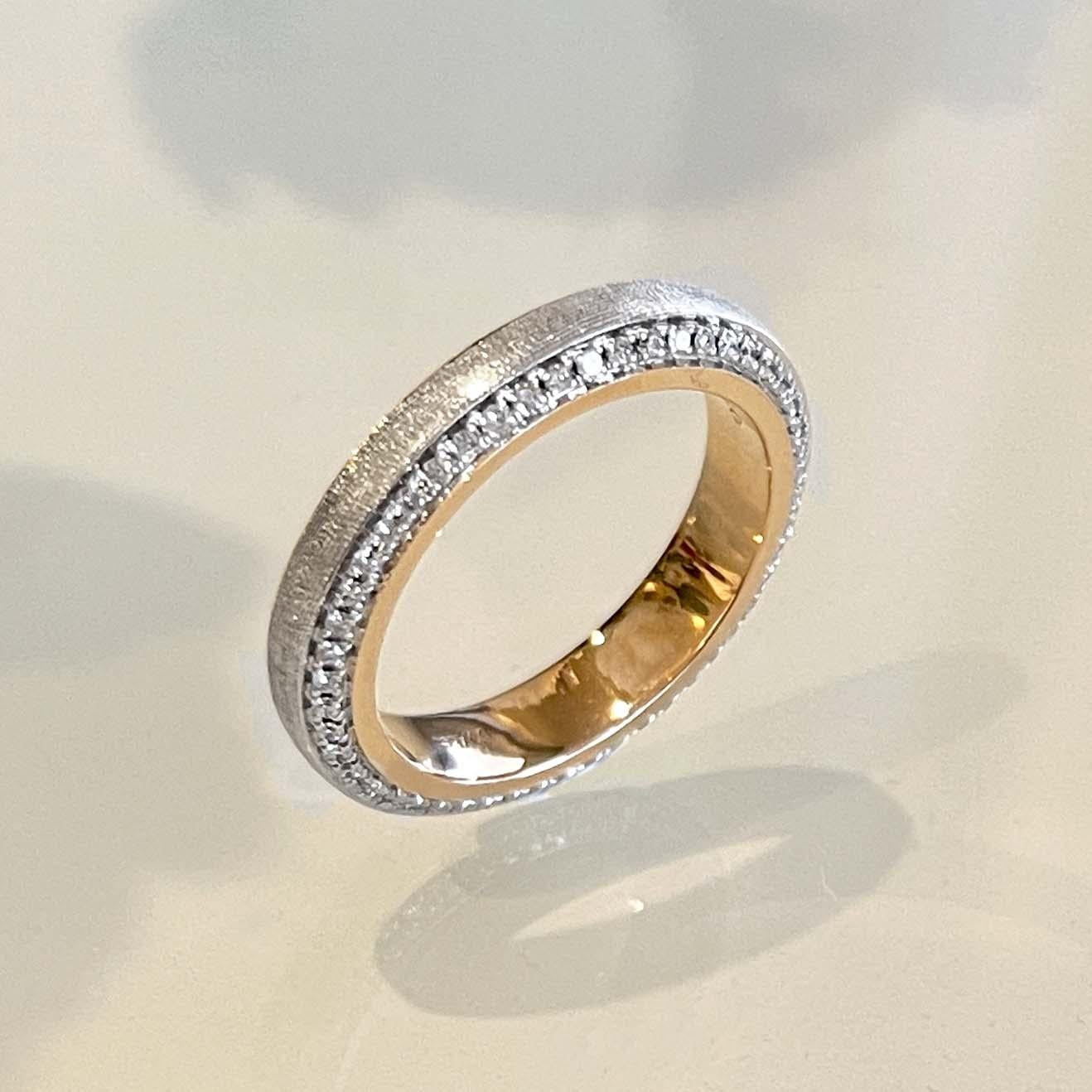 Produced by award winning Italian designer Stefano Vitolo. Stefano creates custom artisanal one of a kind jewelry with excellent gemstones in a truly old world Italian craftmanship.
This handcrafted ring has 0.46 total carat weight of F/G color and
