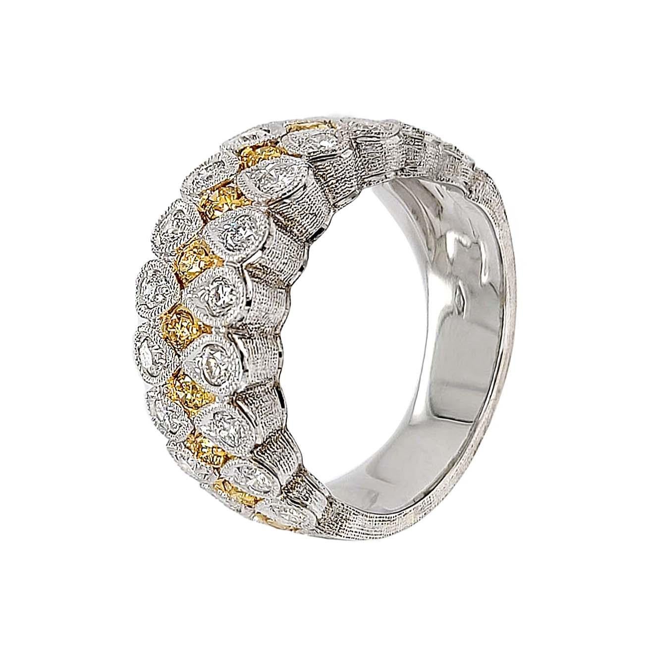 Produced by award winning Italian designer Stefano Vitolo. Stefano creates custom artisanal one of a kind jewelry with excellent gemstones in a truly old world Italian craftmanship.
This handcrafted ring has 0.68 total carat weight of F/G color VS