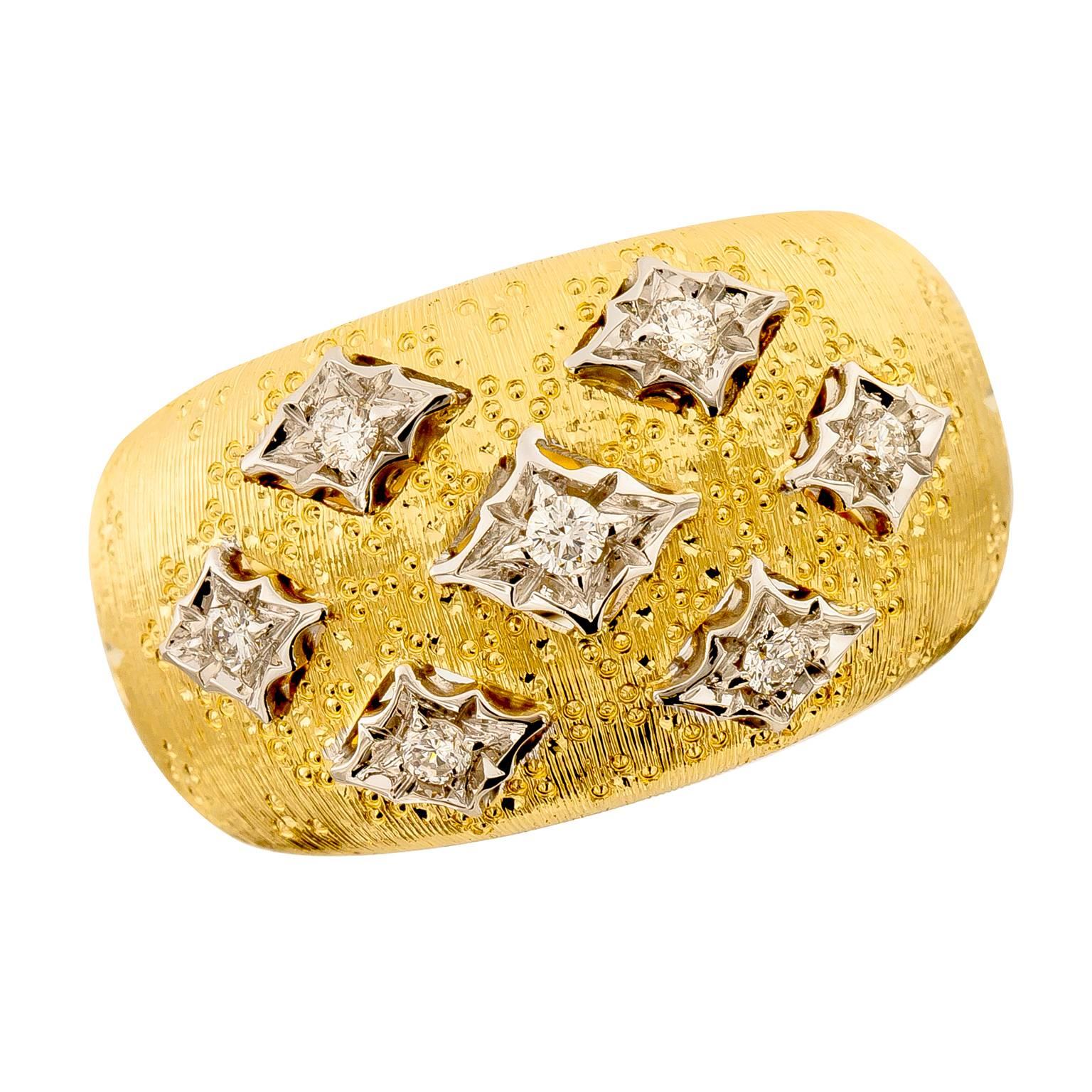 18k yellow and white gold wide dome ring accented with seven diamonds = 0.16 Cttw  Ring is inspired by the classic Buccellati design featuring textured gold made to look like fine fabric. Made in Italy Complimentary signature wrapping & presentation