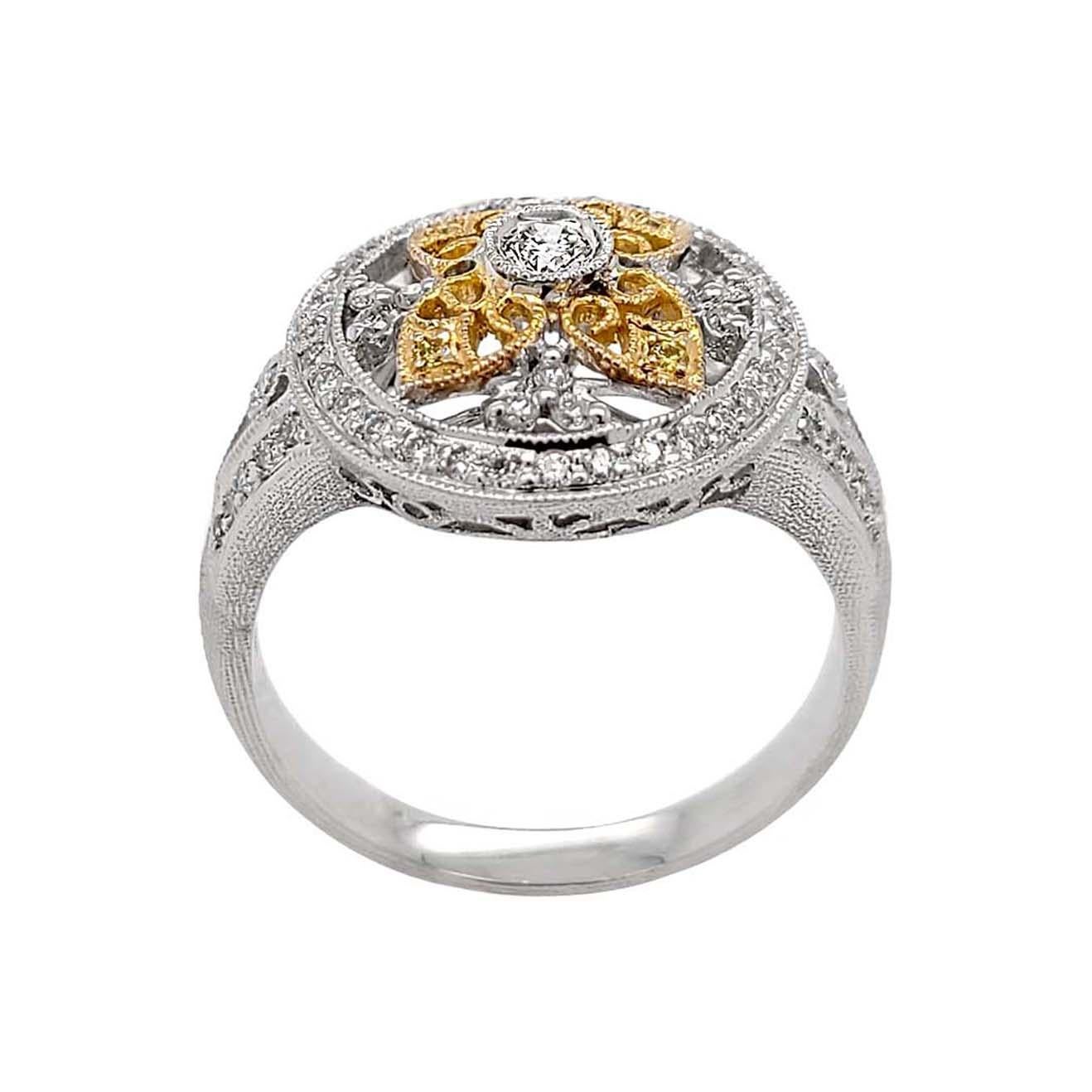 Produced by award winning Italian designer Stefano Vitolo,. Stefano creates custom artisanal one of a kind jewelry with excellent gemstones in a truly old world Italian craftmanship.
This handcrafted ring has 0.59 carat total weight of F/G color  VS
