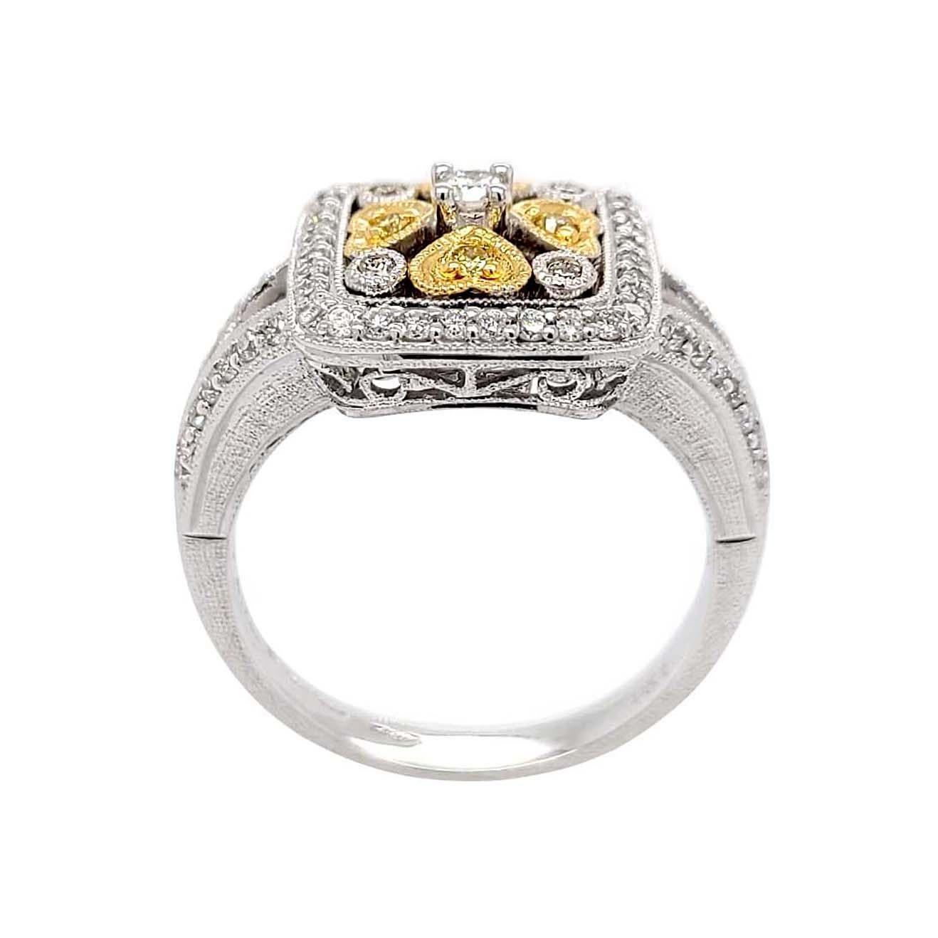 Produced by award winning Italian designer Stefano Vitolo. Stefano, creates custom artisanal one of a kind jewelry with excellent gemstones in a truly old word Italian craftsmanship.
This handcrafted ring has 0.52 total carat weight of G color  VS
