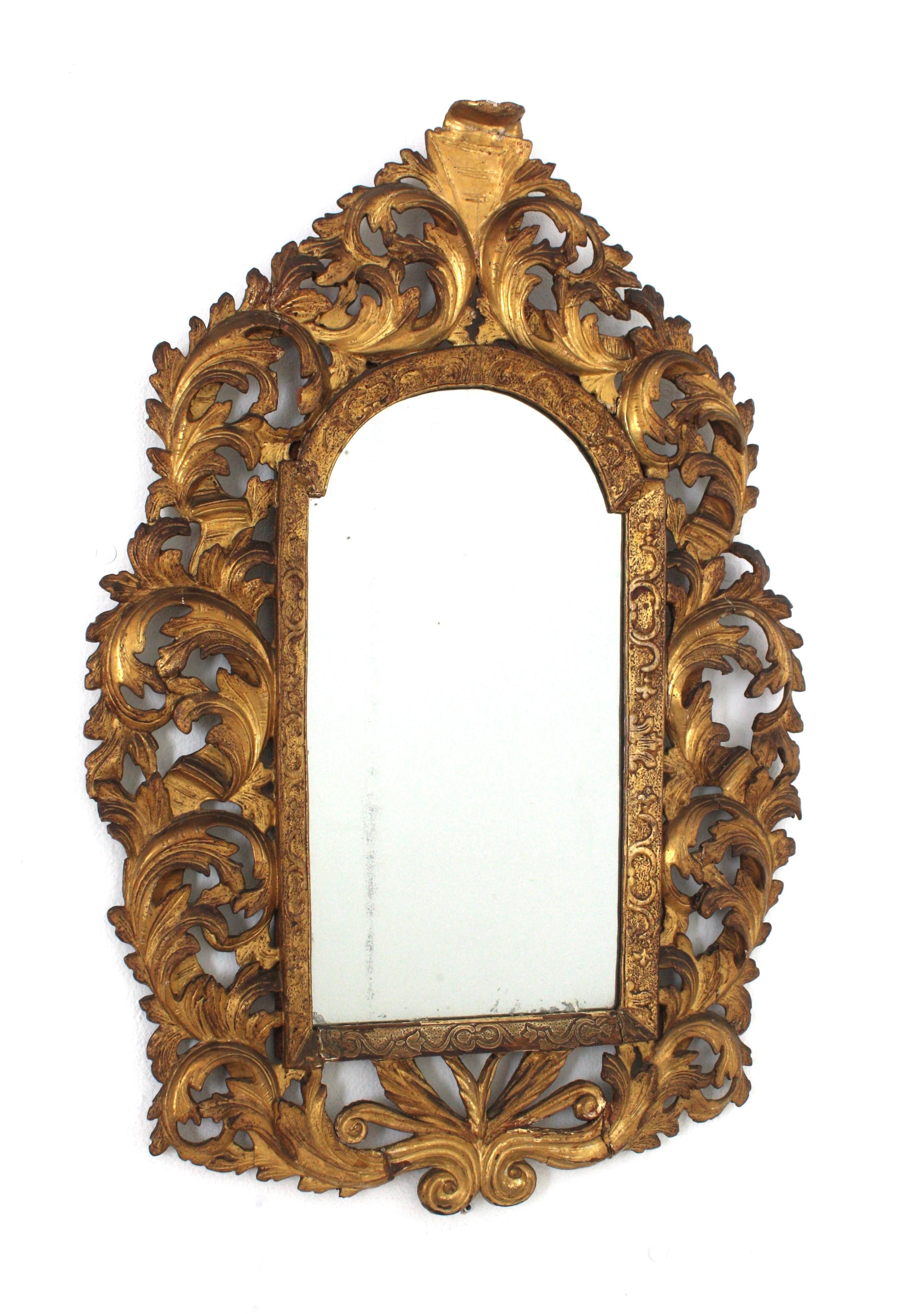 Finely Carved Gold Leaf Giltwood Florentine Wall / Console Mirror, Italy, 1930s-1940s
The frame is richly adorned with carved acanthusleaves, scroll details. It wears its original glass. 
Nice aged patina and original gold leaf gilding.
Lovely to