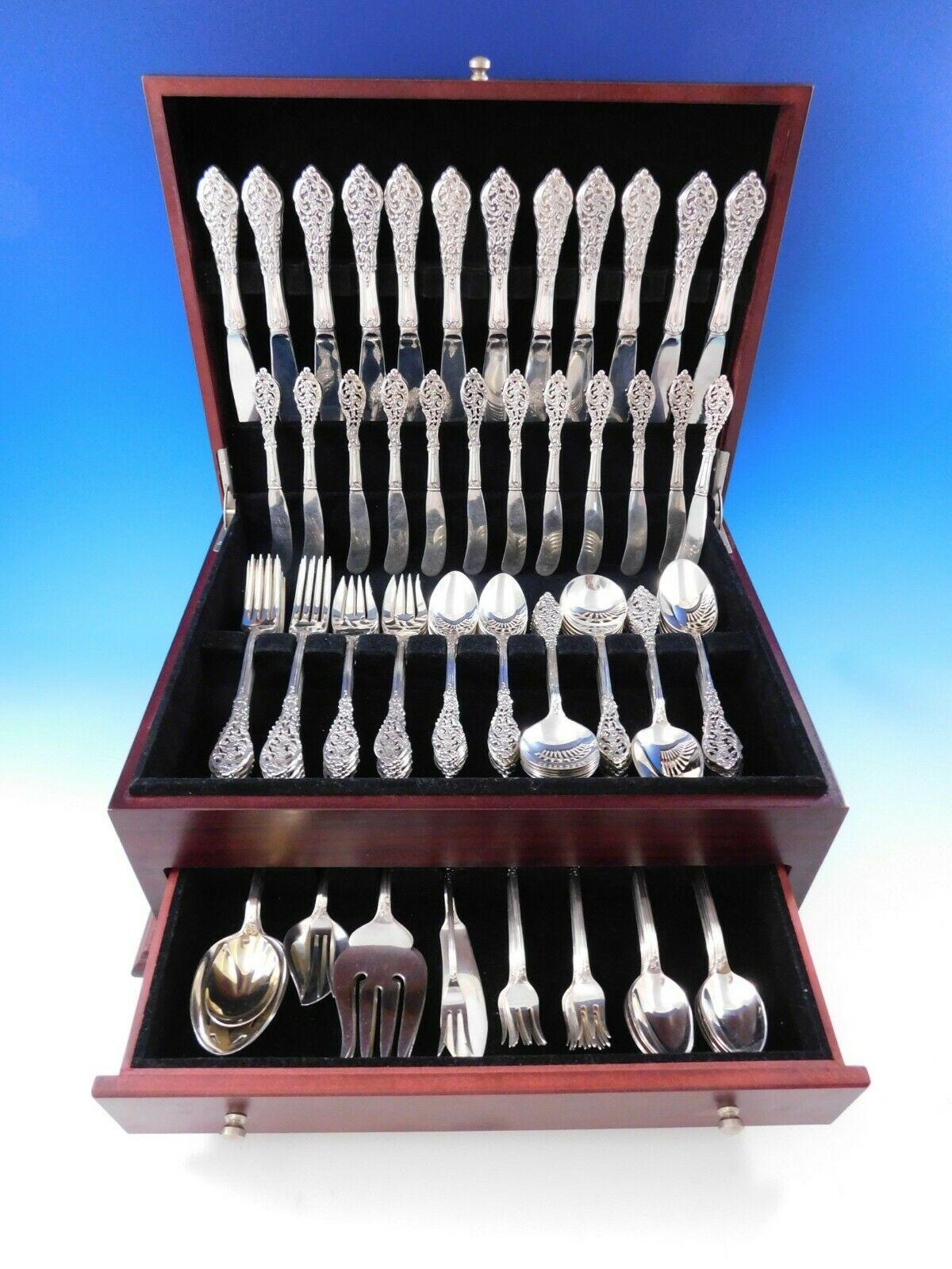 Monumental Florentine Lace by Reed & Barton sterling silver flatware set, 117 pieces. This pattern features a stunning pieced handle and delicate lace-like detail. This set includes:

12 knives, 9