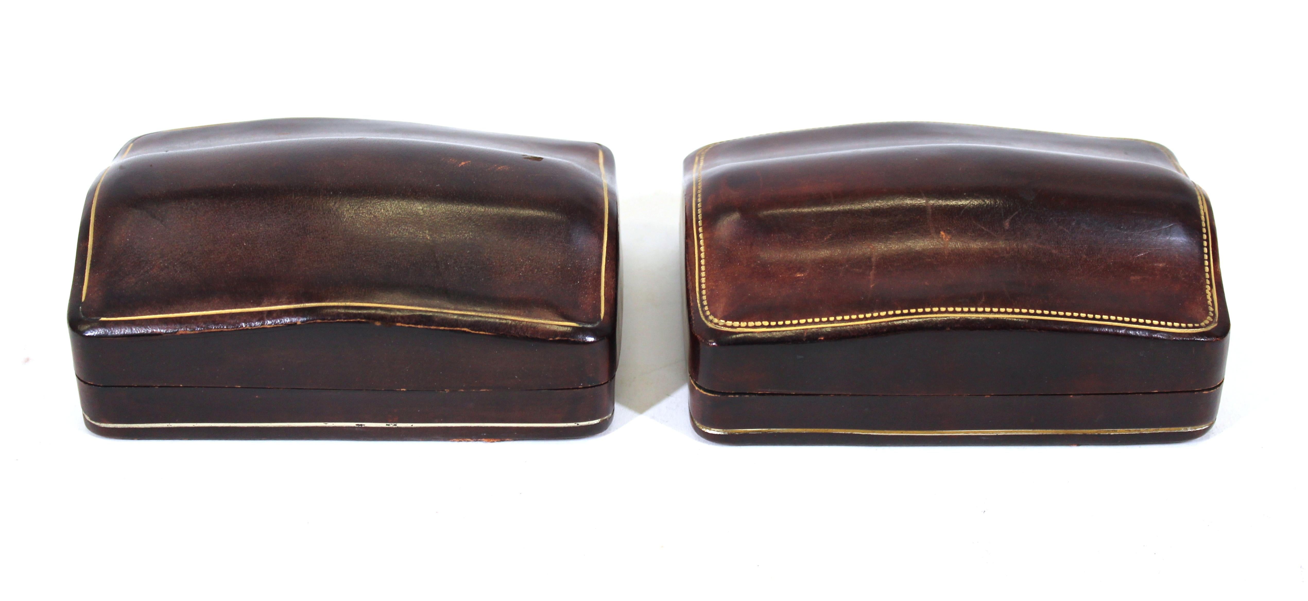 Pair of Florentine handmade leather humpback trinket boxes with gold embossing, circa 1960's.