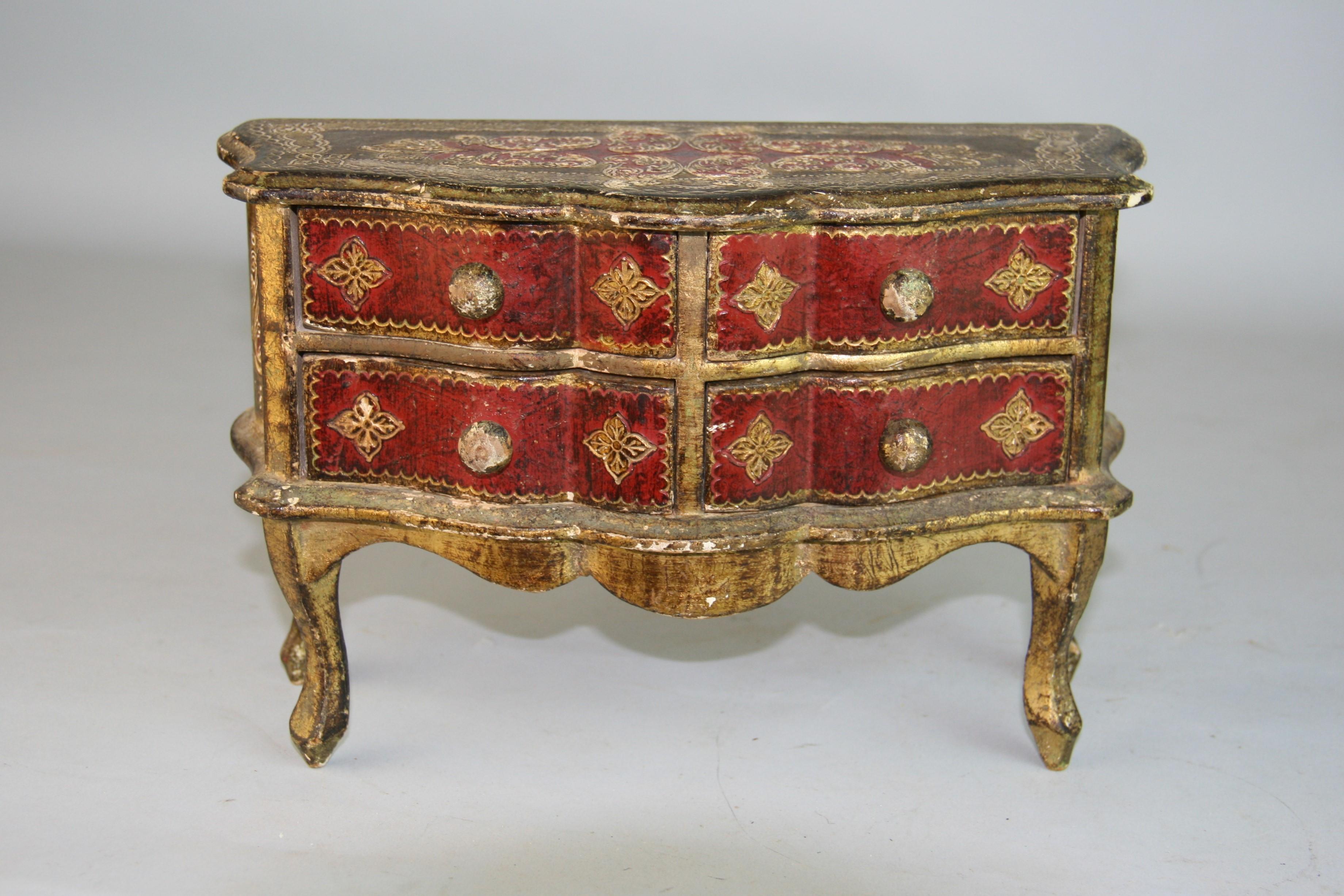 1419 Italian hand crafted  4 drawer jewelry box in the shape of  a rococo chest of drawers .