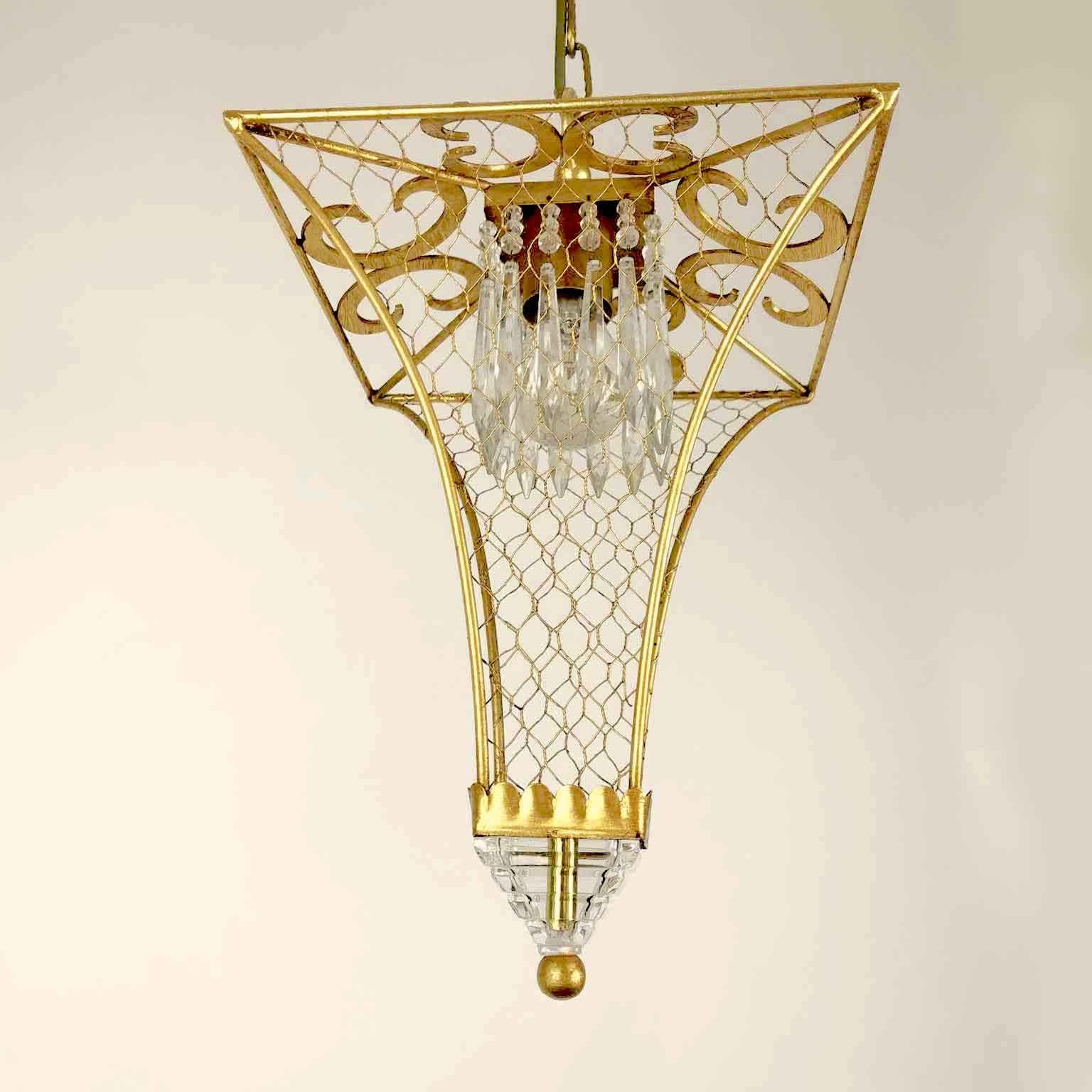 Vintage Italian lantern with a leaf-gilded iron pagoda shaped cage realized with wrought iron scrolls in the upper part and decorated with net sides, finial frosted glass elements, the E27 light in the upper part is surrounded by a ring of crystal