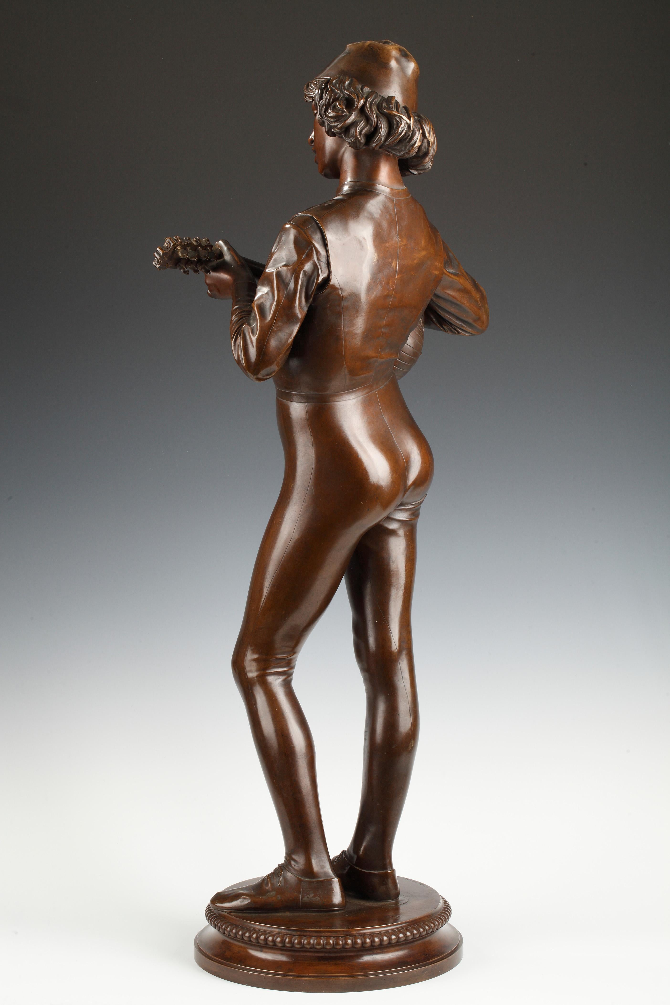 Signed P. Dubois 1865 and F. Barbedienne fondeur
Stamped with réduction mécanique Collas 

A patinated bronze « Florentine Singer » sculpture, inspired by the Italian journey of Dubois and the historicist taste. The plaster model was exhibited at