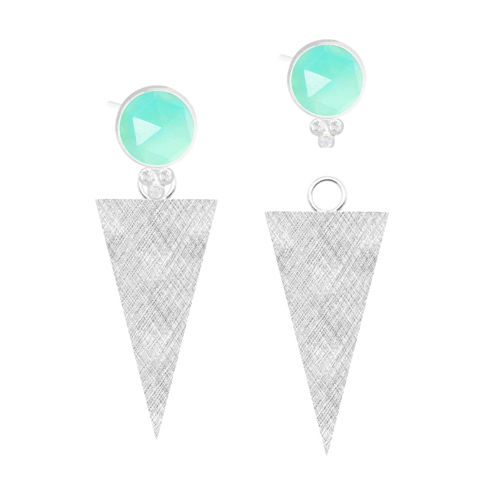 A Nina Nguyen classic: Our Chloe Chrysoprase Silver Studs are designed with faceted chrysoprases rimmed in silver, and accented with gemstones for some extra sparkle.

Metal: Sterling Silver
Stone carat: 7
Stone size: 10mm

About the