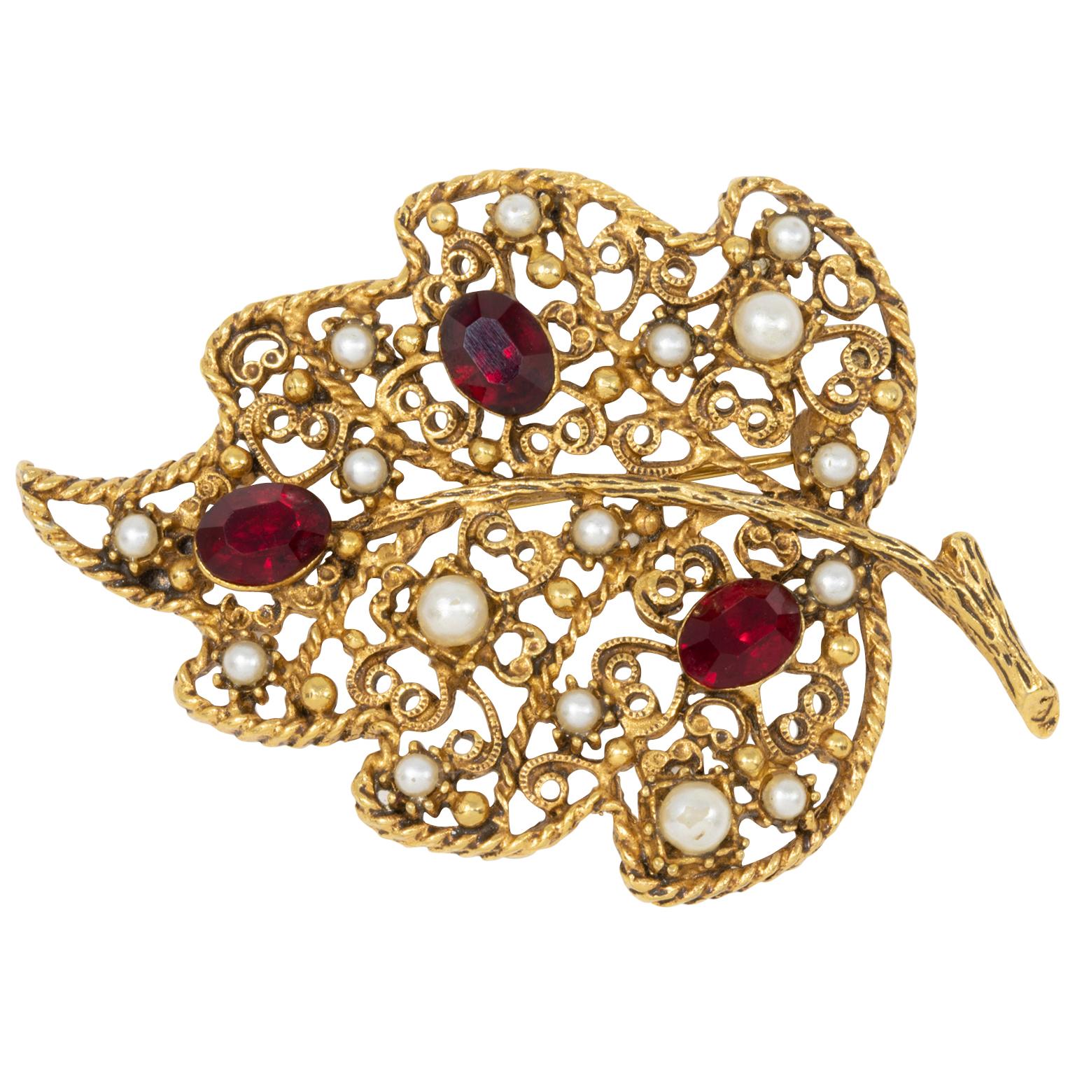 Florenza Ruby Crystal and Faux Pearl Filigree Leaf Pin Brooch in Gold For Sale