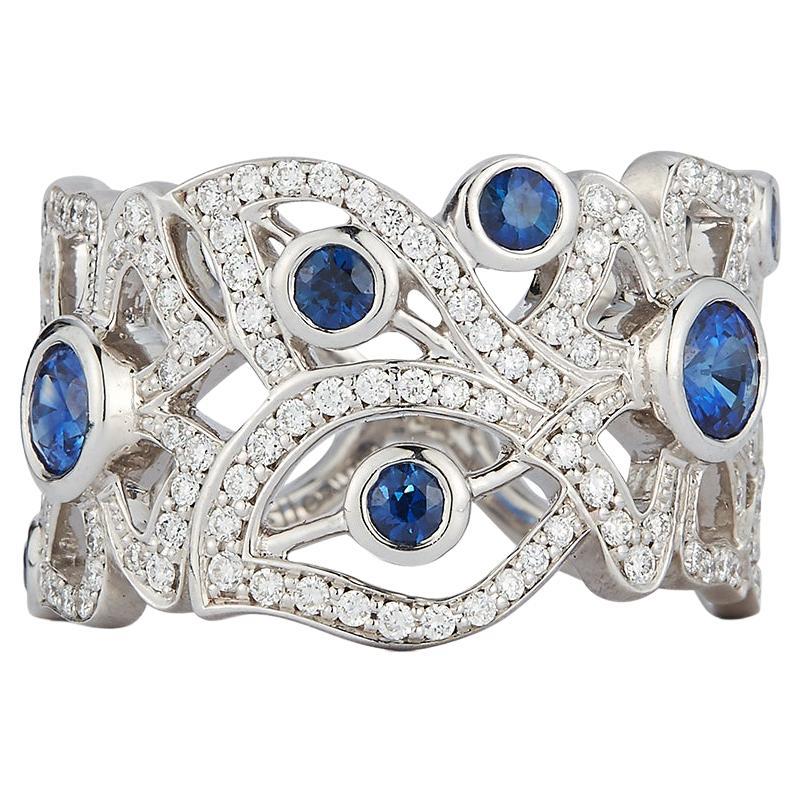 Carelle, bague jonc fleurie en saphir bleu et diamants