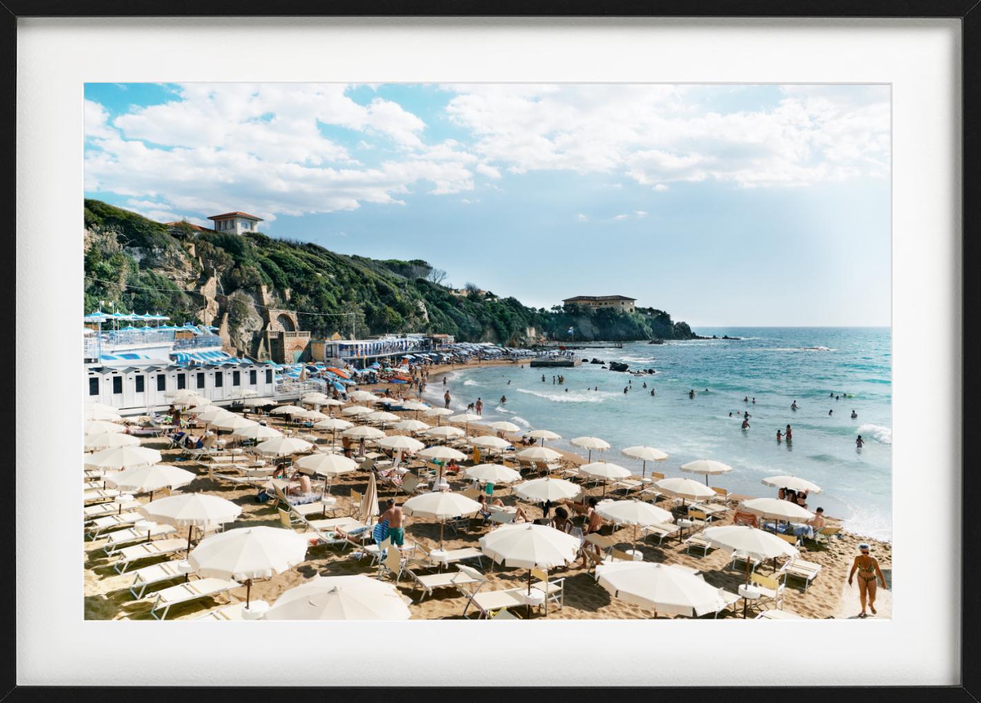Quercetano Italy Uno- Beach and Sea View with Umbrellas, People, and Mountains - Contemporary Photograph by Florian Innerkofler